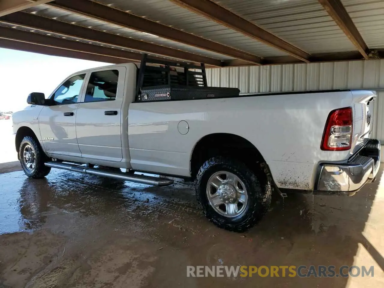2 Photograph of a damaged car 3C6UR5HJ3LG262376 RAM 2500 2020