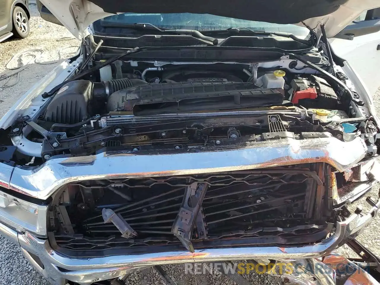 12 Photograph of a damaged car 3C6UR5HJ7LG248383 RAM 2500 2020