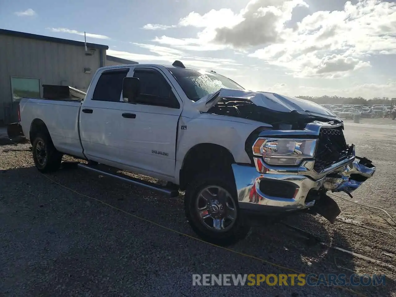 4 Photograph of a damaged car 3C6UR5HJ7LG248383 RAM 2500 2020