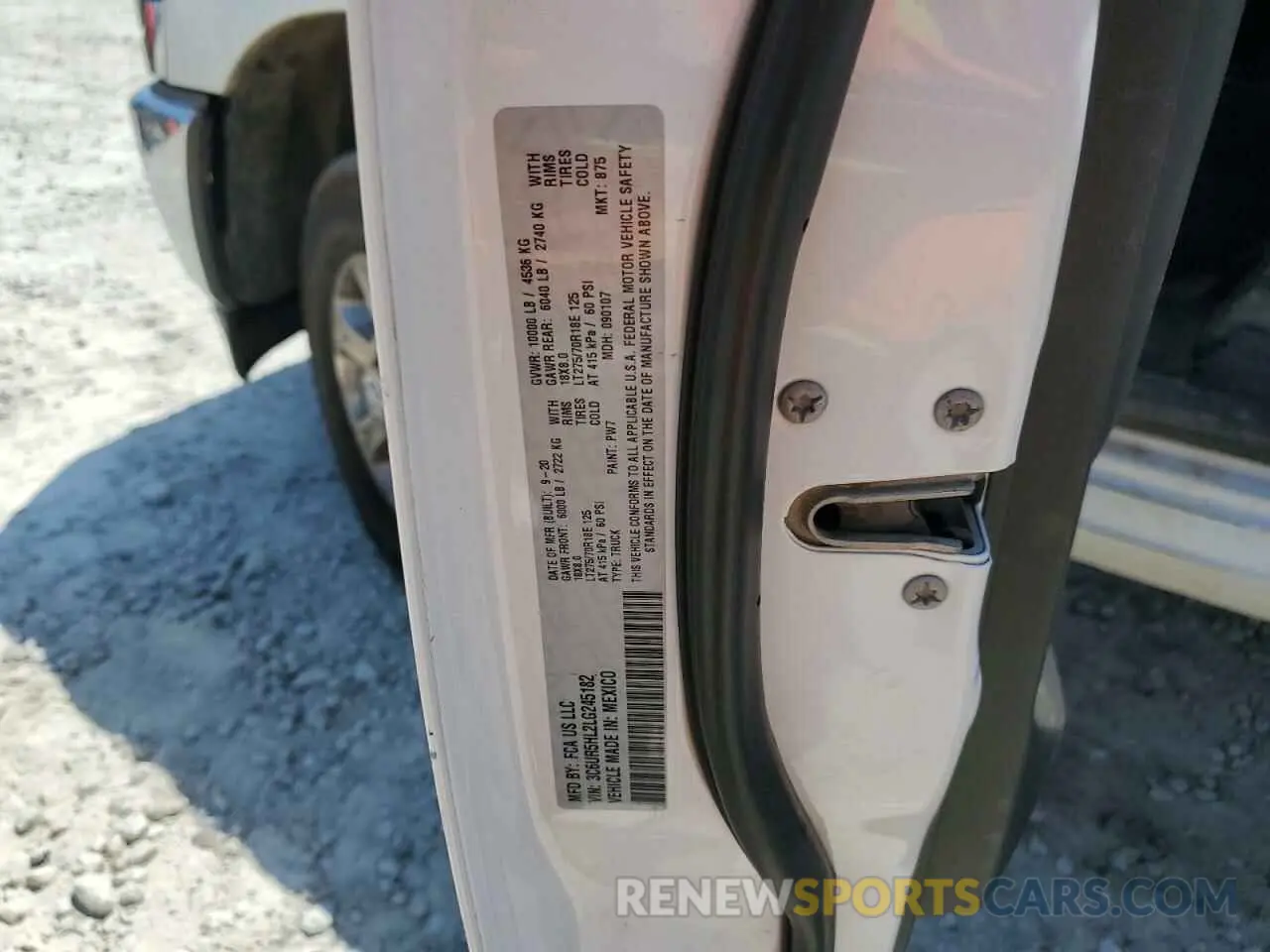 12 Photograph of a damaged car 3C6UR5HL2LG245182 RAM 2500 2020