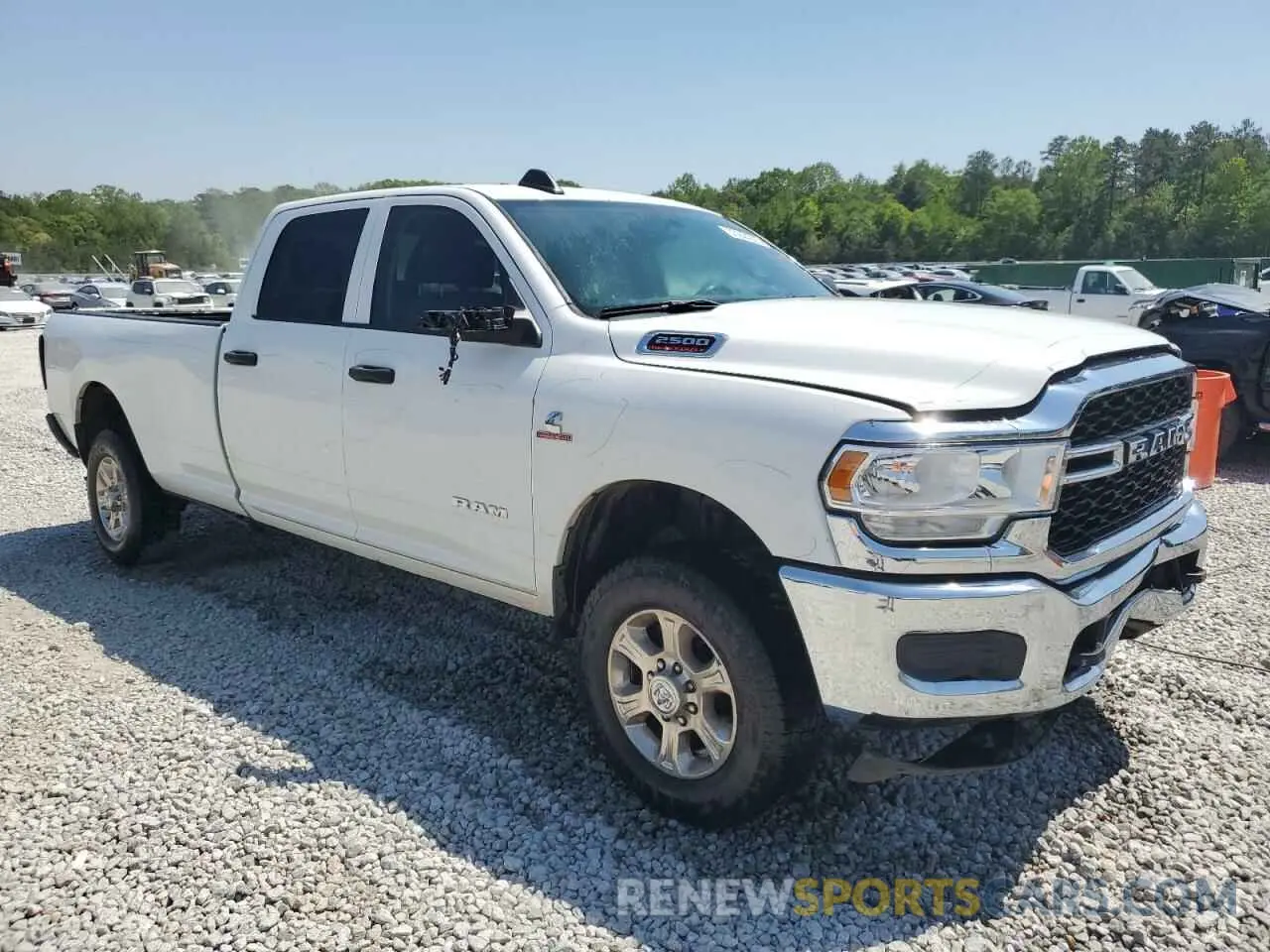 4 Photograph of a damaged car 3C6UR5HL2LG245182 RAM 2500 2020