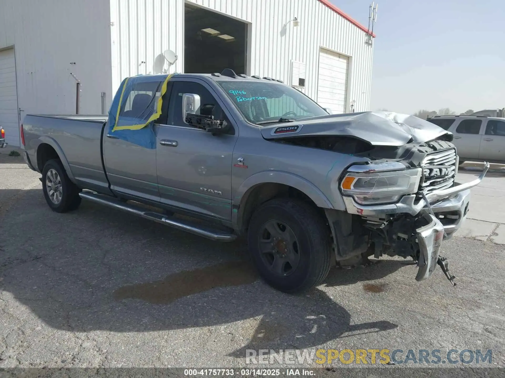 1 Photograph of a damaged car 3C6UR5KL5LG148079 RAM 2500 2020