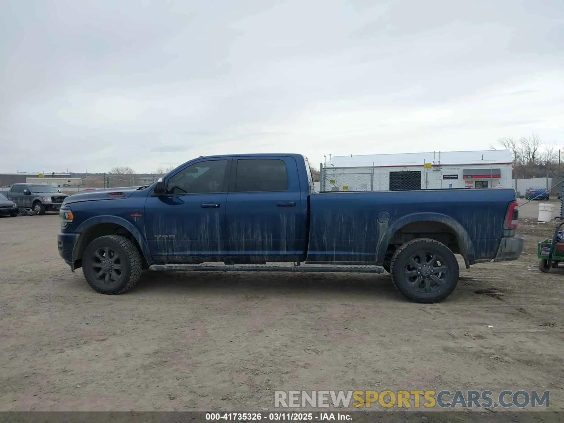 14 Photograph of a damaged car 3C6UR5KL5LG267556 RAM 2500 2020