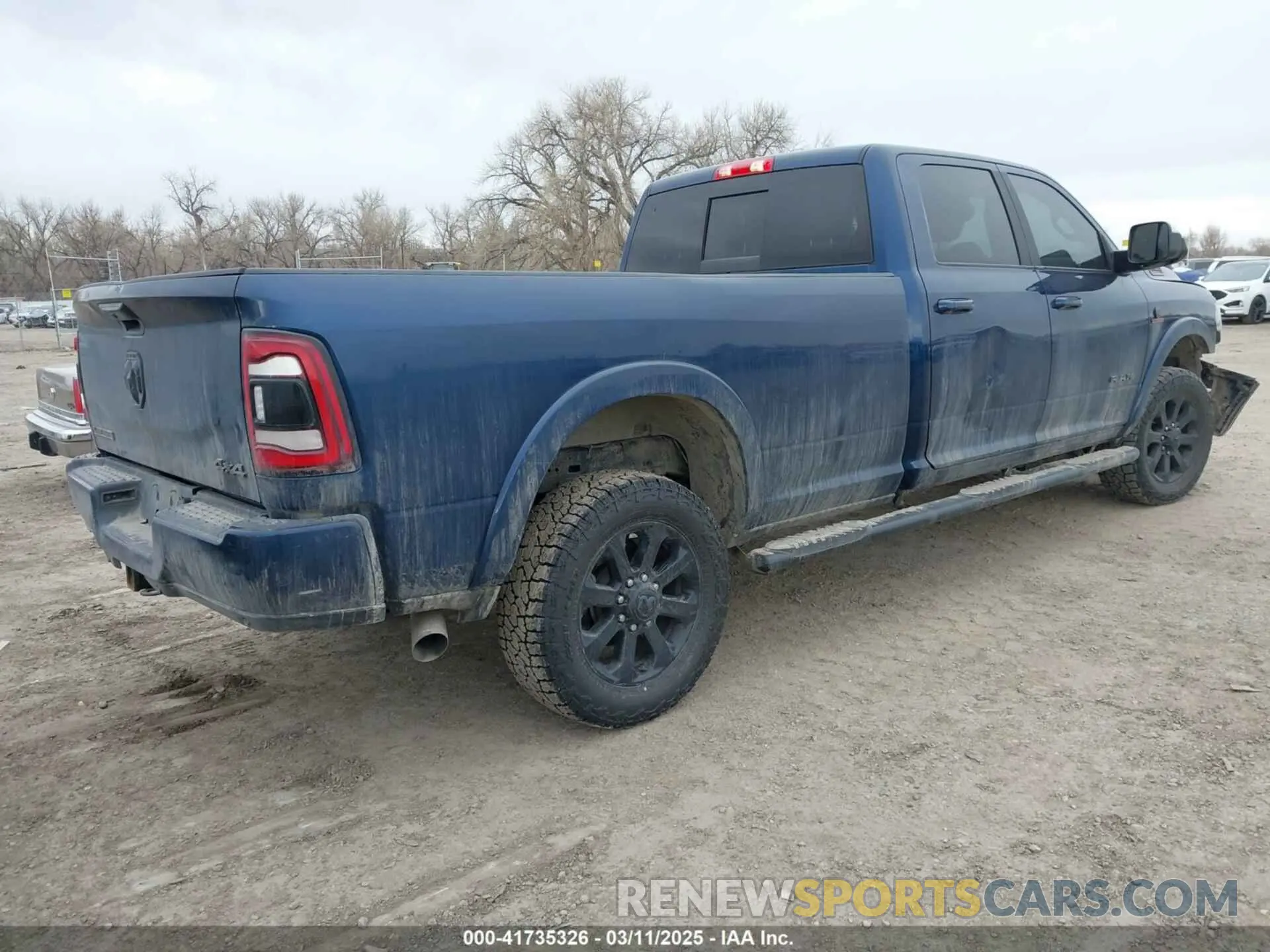 4 Photograph of a damaged car 3C6UR5KL5LG267556 RAM 2500 2020
