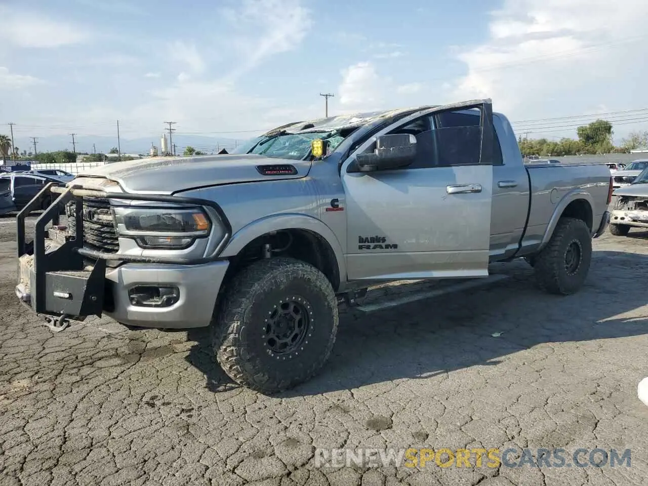 1 Photograph of a damaged car 3C6UR5NL8LG274089 RAM 2500 2020