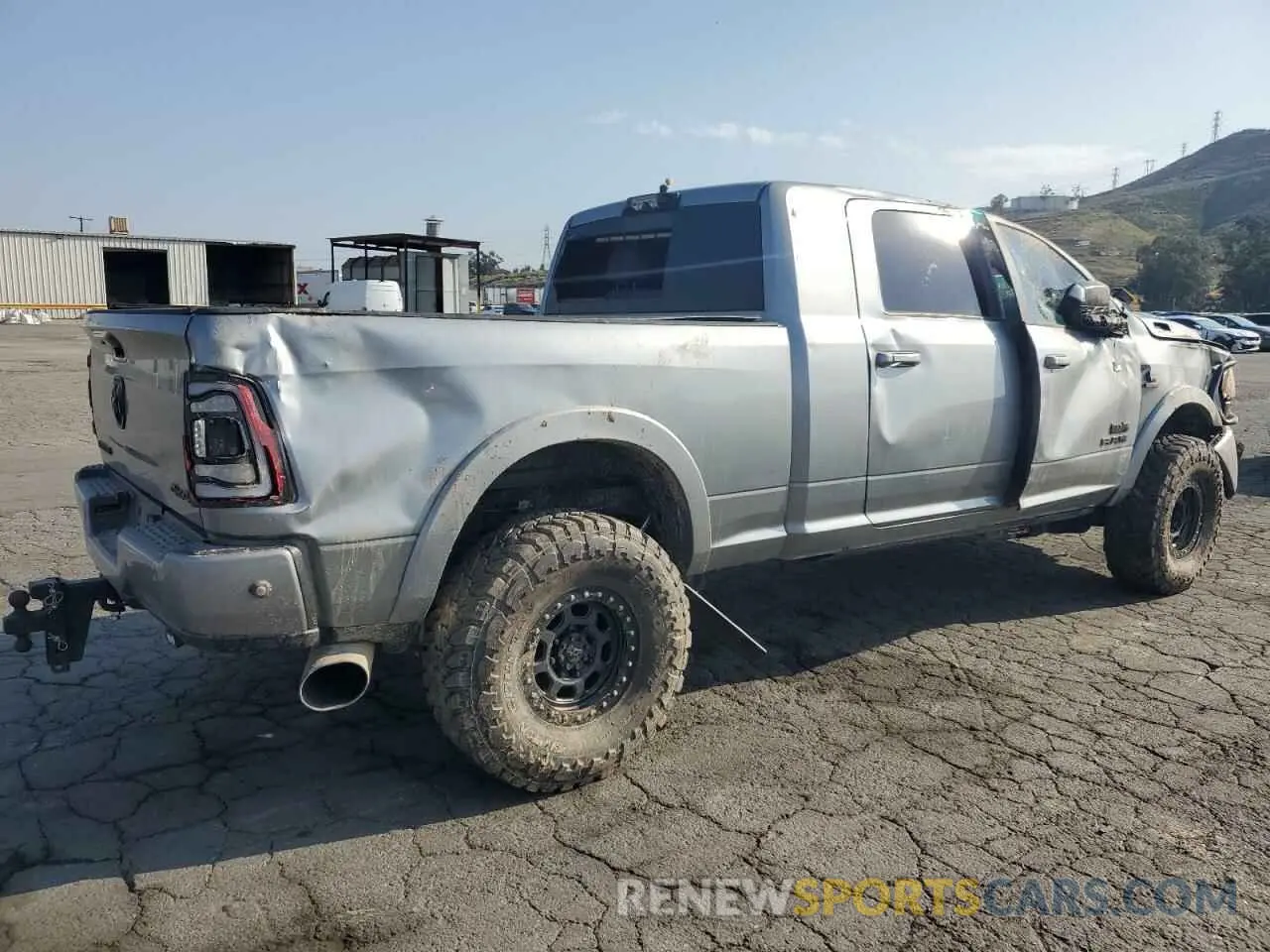 3 Photograph of a damaged car 3C6UR5NL8LG274089 RAM 2500 2020