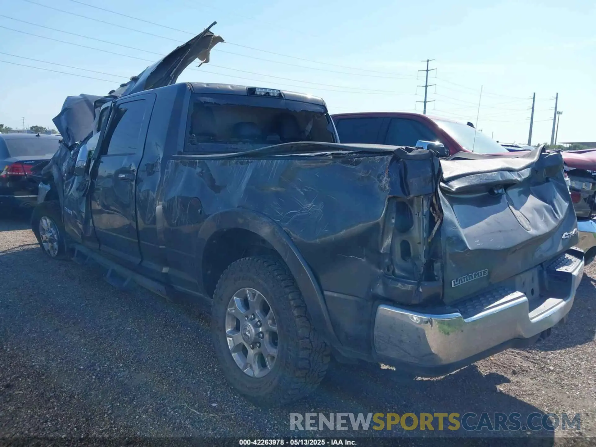 3 Photograph of a damaged car 3C6UR5NLXLG314141 RAM 2500 2020