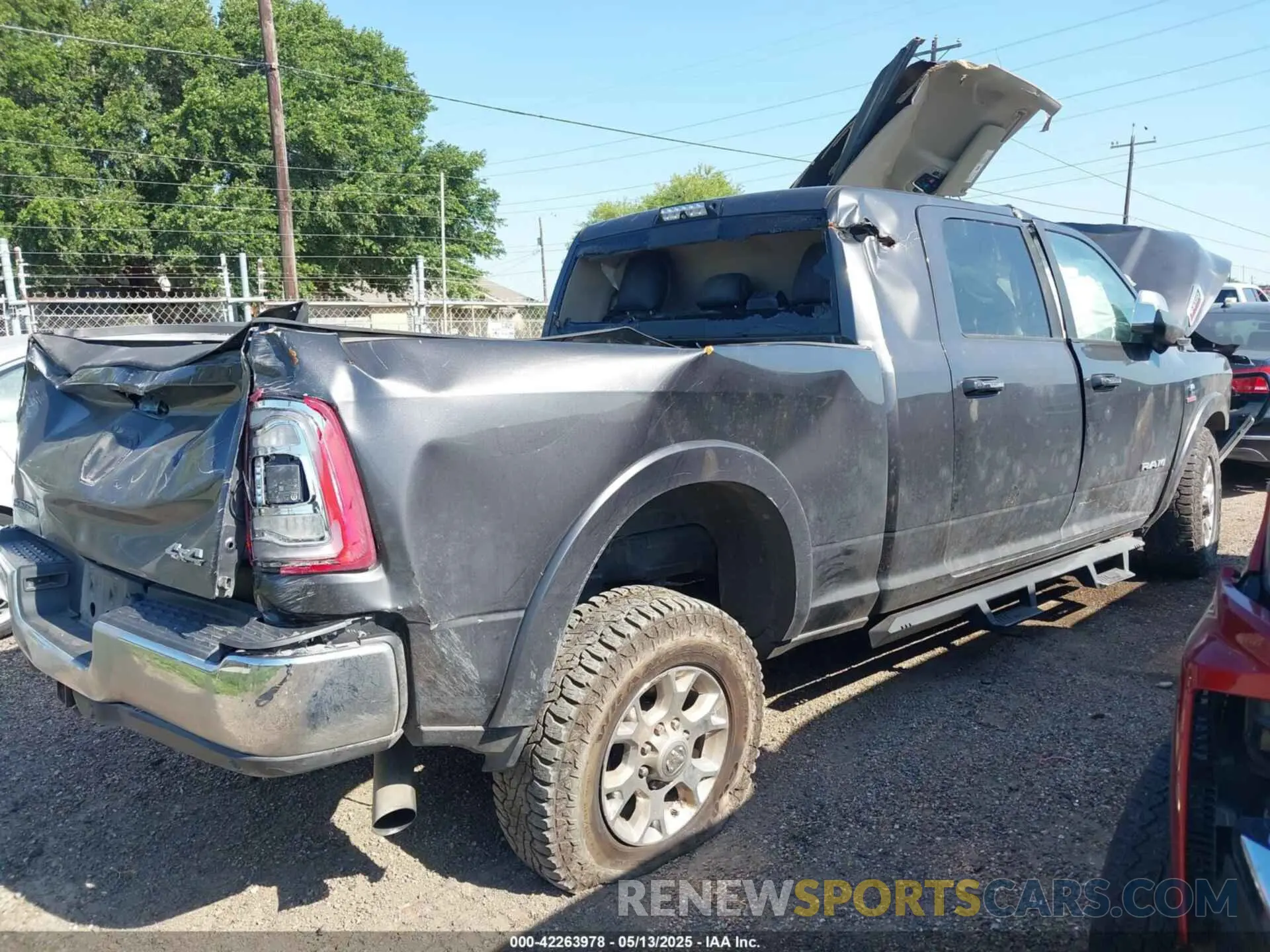 4 Photograph of a damaged car 3C6UR5NLXLG314141 RAM 2500 2020