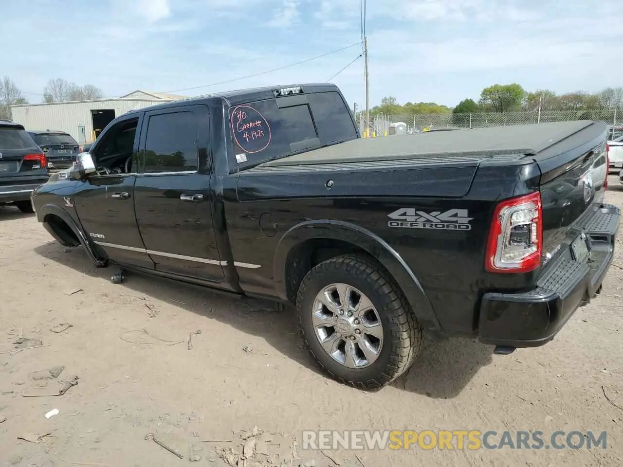 2 Photograph of a damaged car 3C6UR5SL1LG109666 RAM 2500 2020