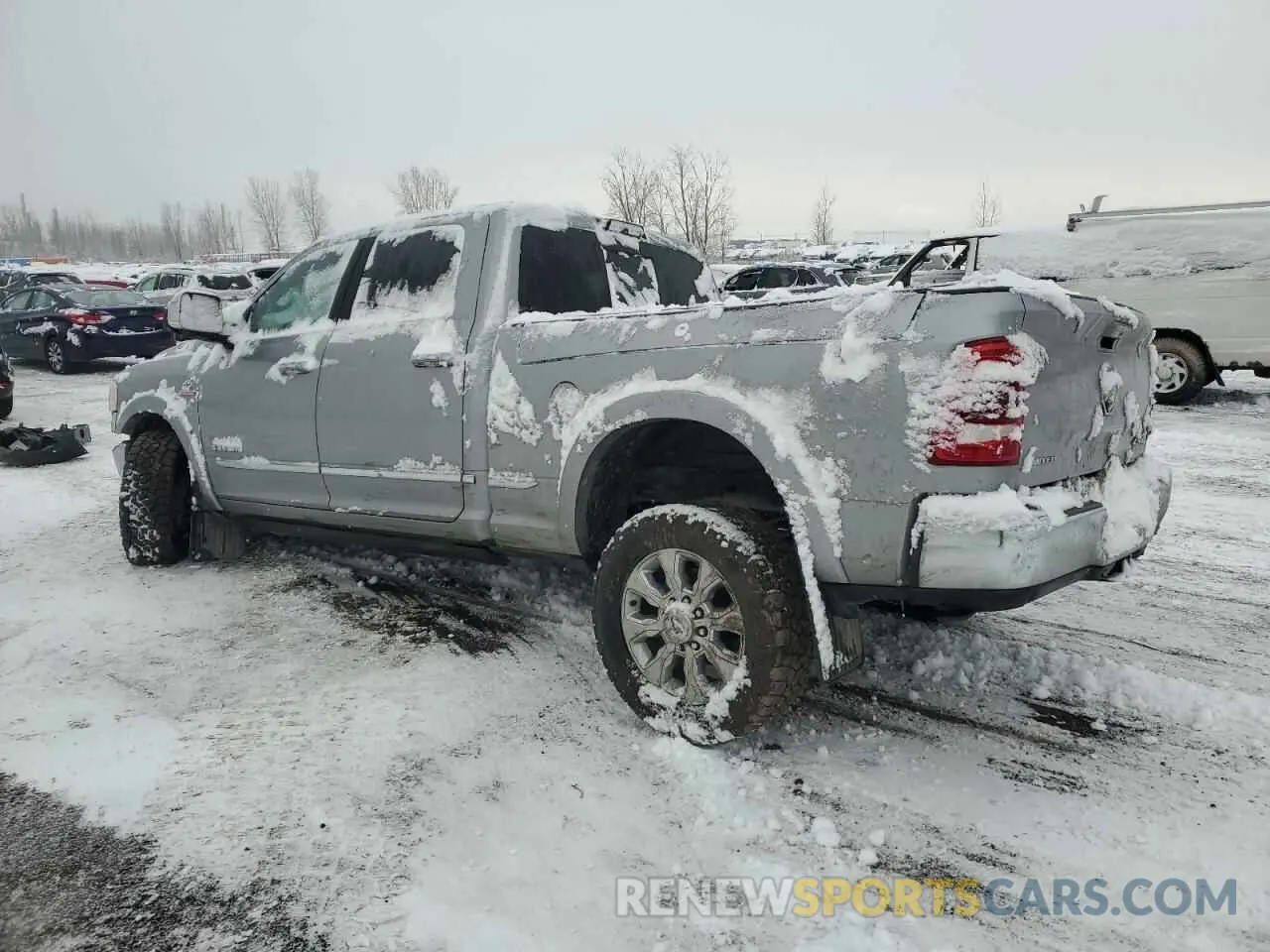 2 Photograph of a damaged car 3C6UR5SL8LG120616 RAM 2500 2020