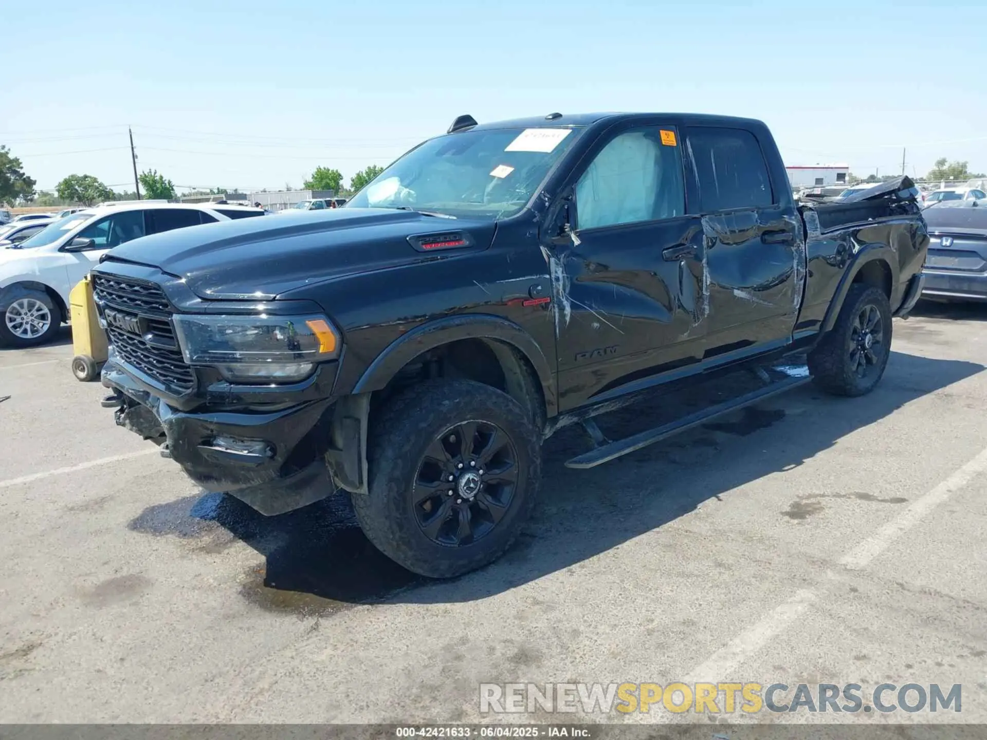 2 Photograph of a damaged car 3C6UR5SL8LG286098 RAM 2500 2020