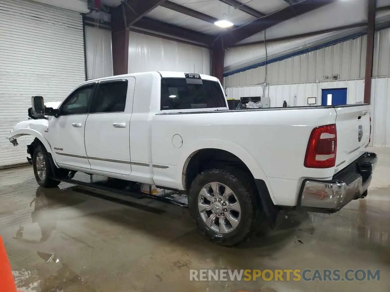 2 Photograph of a damaged car 3C6UR5TL0LG263591 RAM 2500 2020