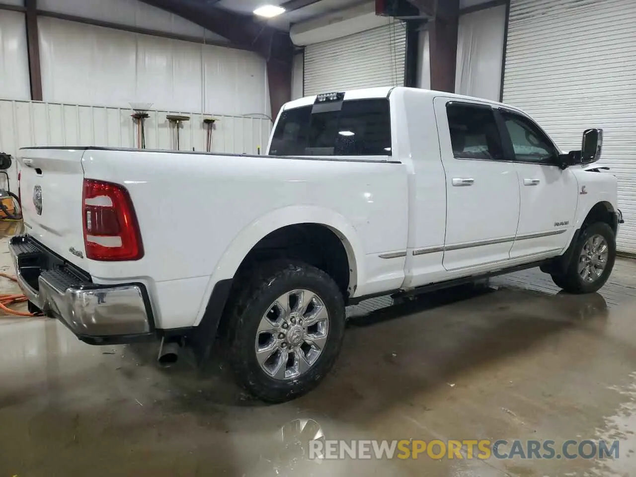 3 Photograph of a damaged car 3C6UR5TL0LG263591 RAM 2500 2020