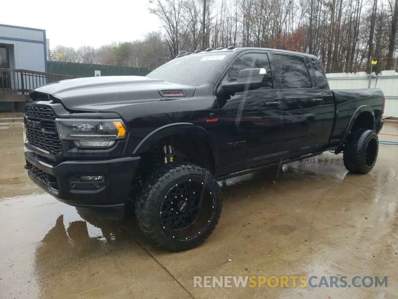 1 Photograph of a damaged car 3C6UR5TL1LG201617 RAM 2500 2020