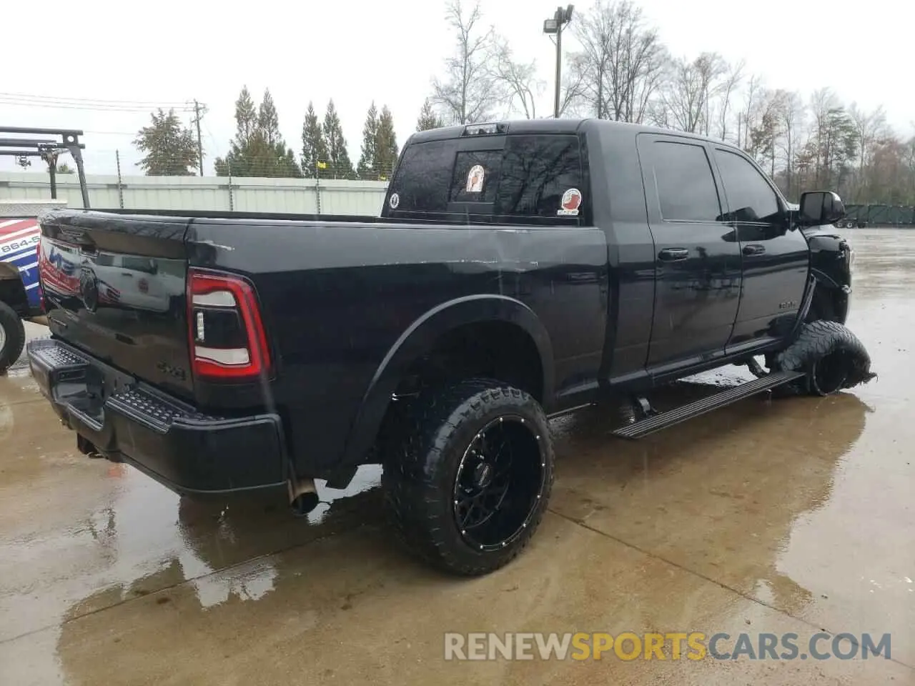 3 Photograph of a damaged car 3C6UR5TL1LG201617 RAM 2500 2020