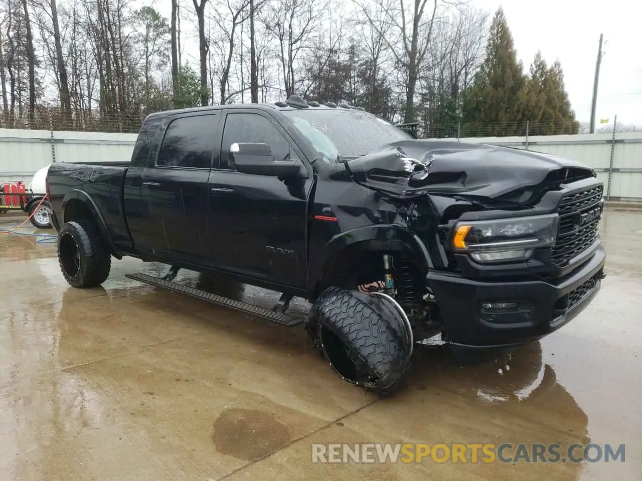 4 Photograph of a damaged car 3C6UR5TL1LG201617 RAM 2500 2020