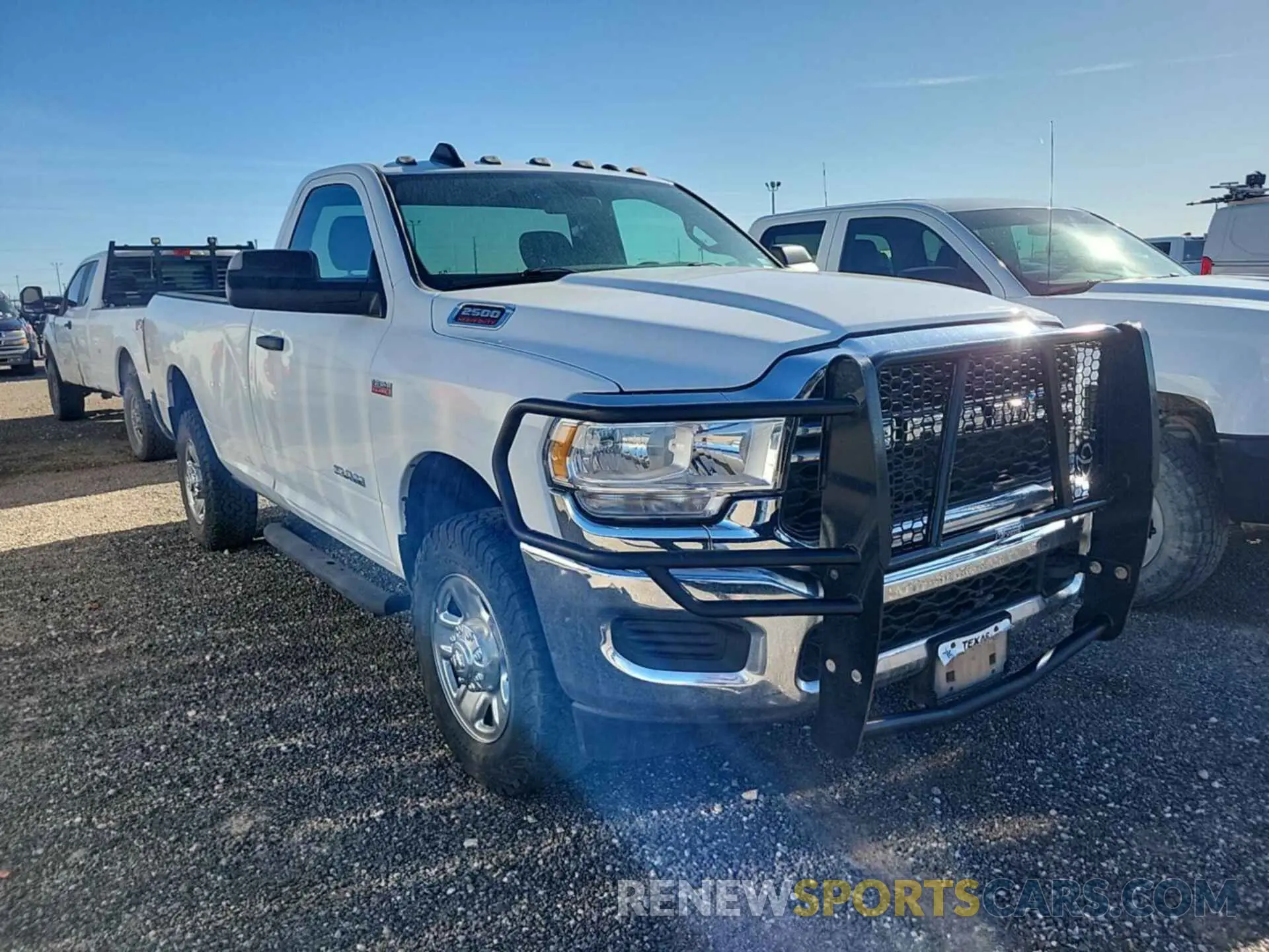 14 Photograph of a damaged car 3C6MR5AJ8MG611026 RAM 2500 2021