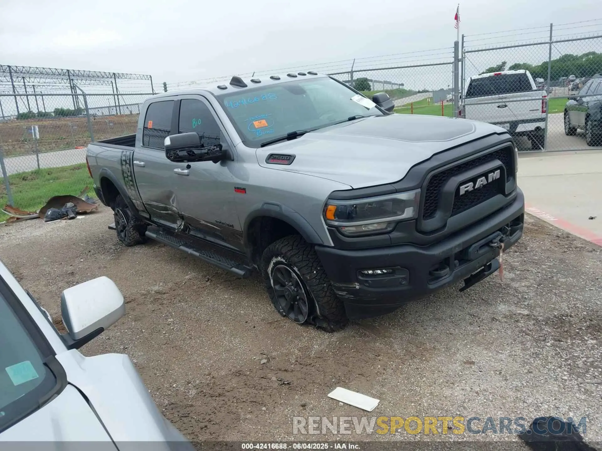1 Photograph of a damaged car 3C6TR5EJ5MG501492 RAM 2500 2021