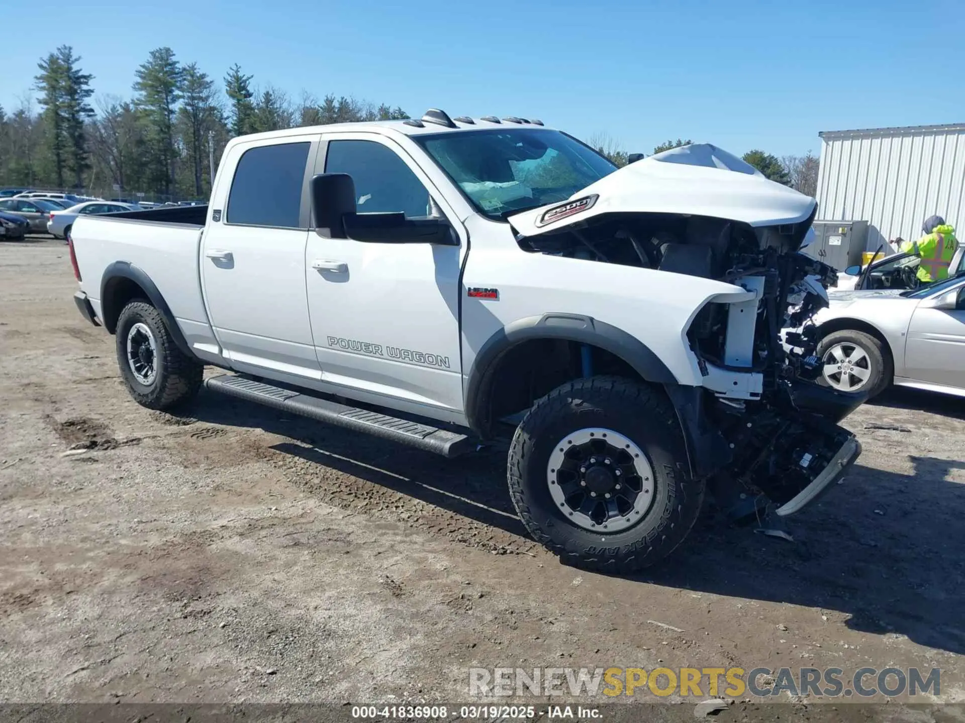 1 Photograph of a damaged car 3C6TR5EJ7MG658697 RAM 2500 2021
