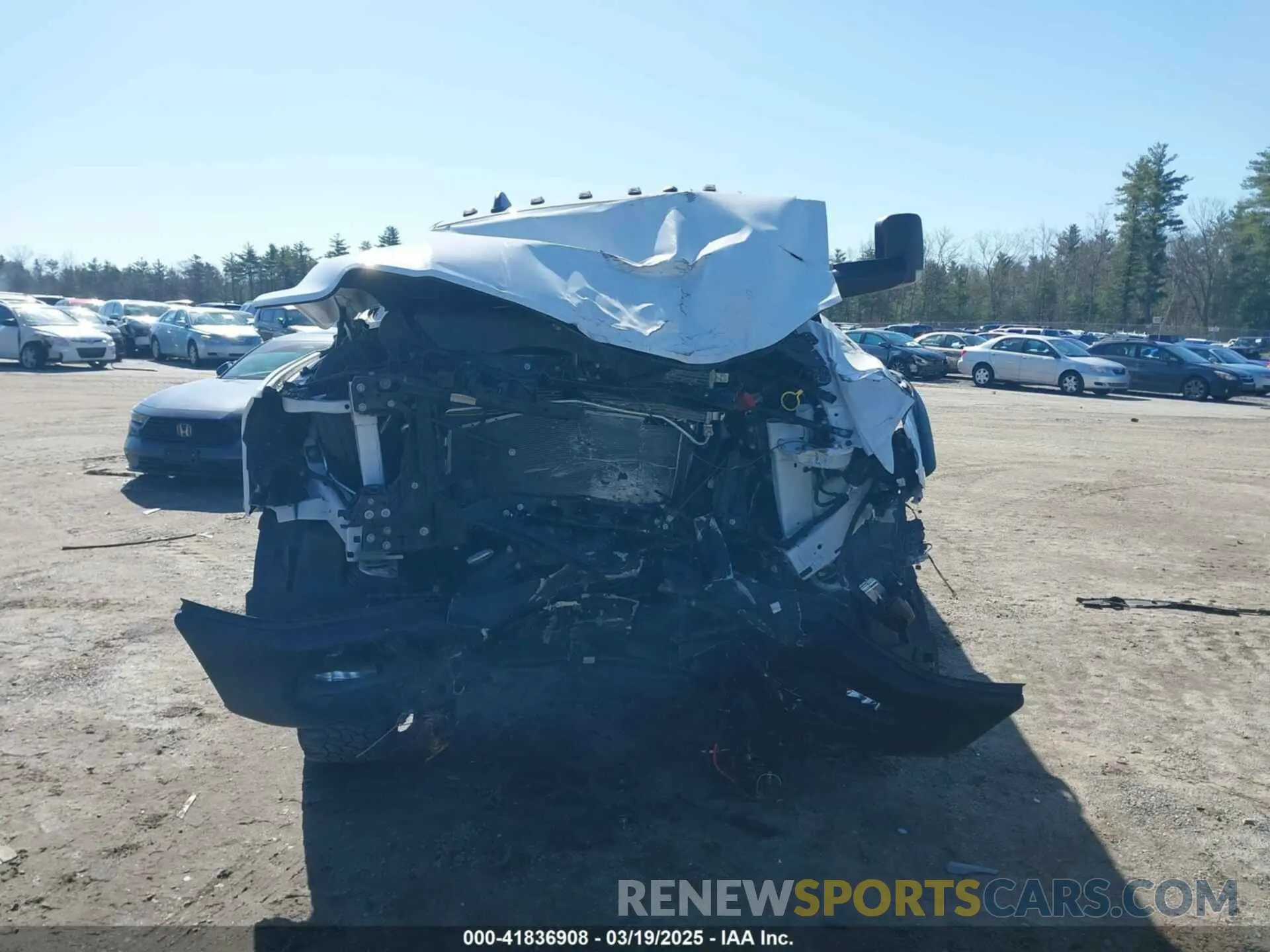 13 Photograph of a damaged car 3C6TR5EJ7MG658697 RAM 2500 2021