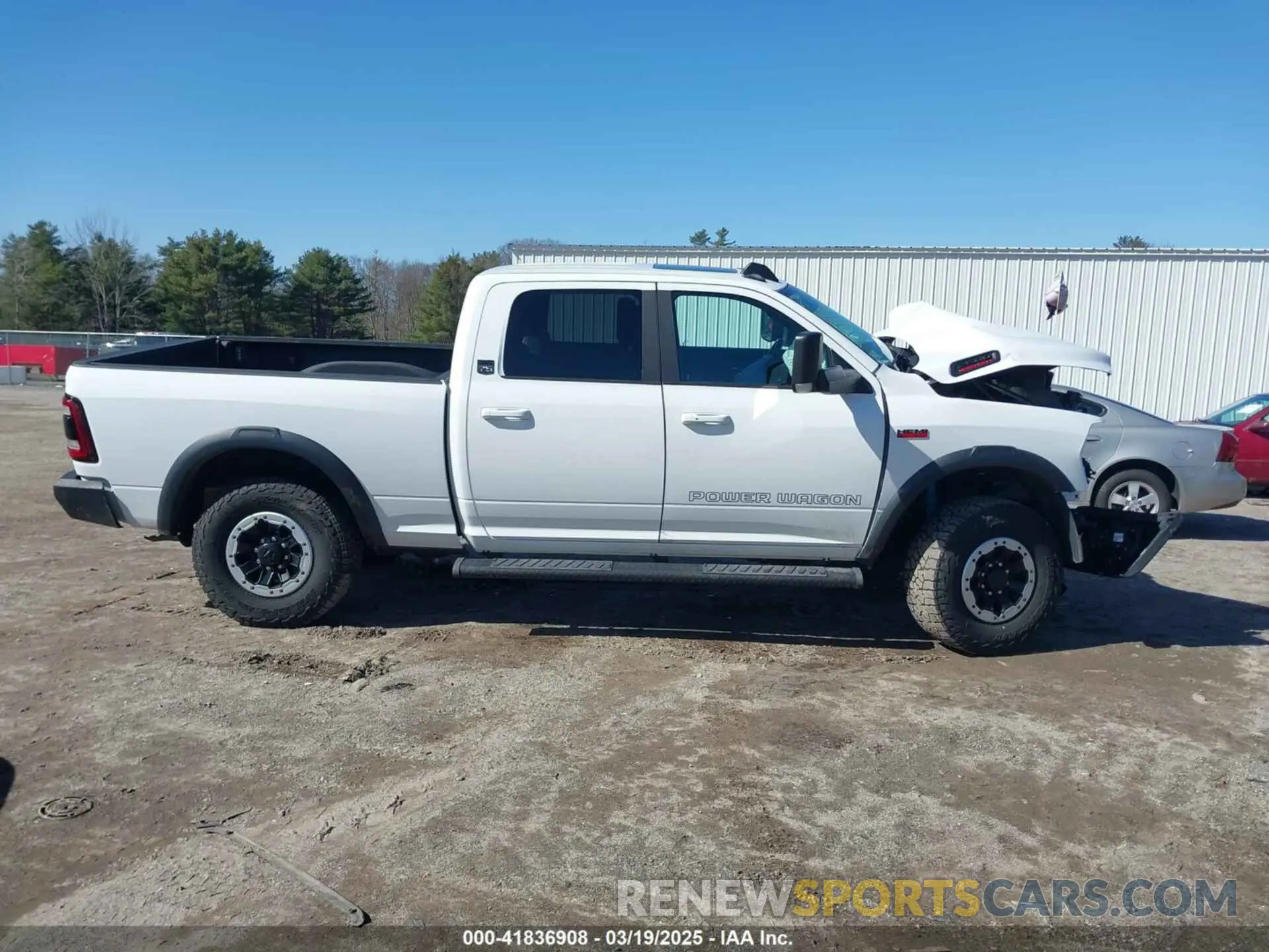 14 Photograph of a damaged car 3C6TR5EJ7MG658697 RAM 2500 2021