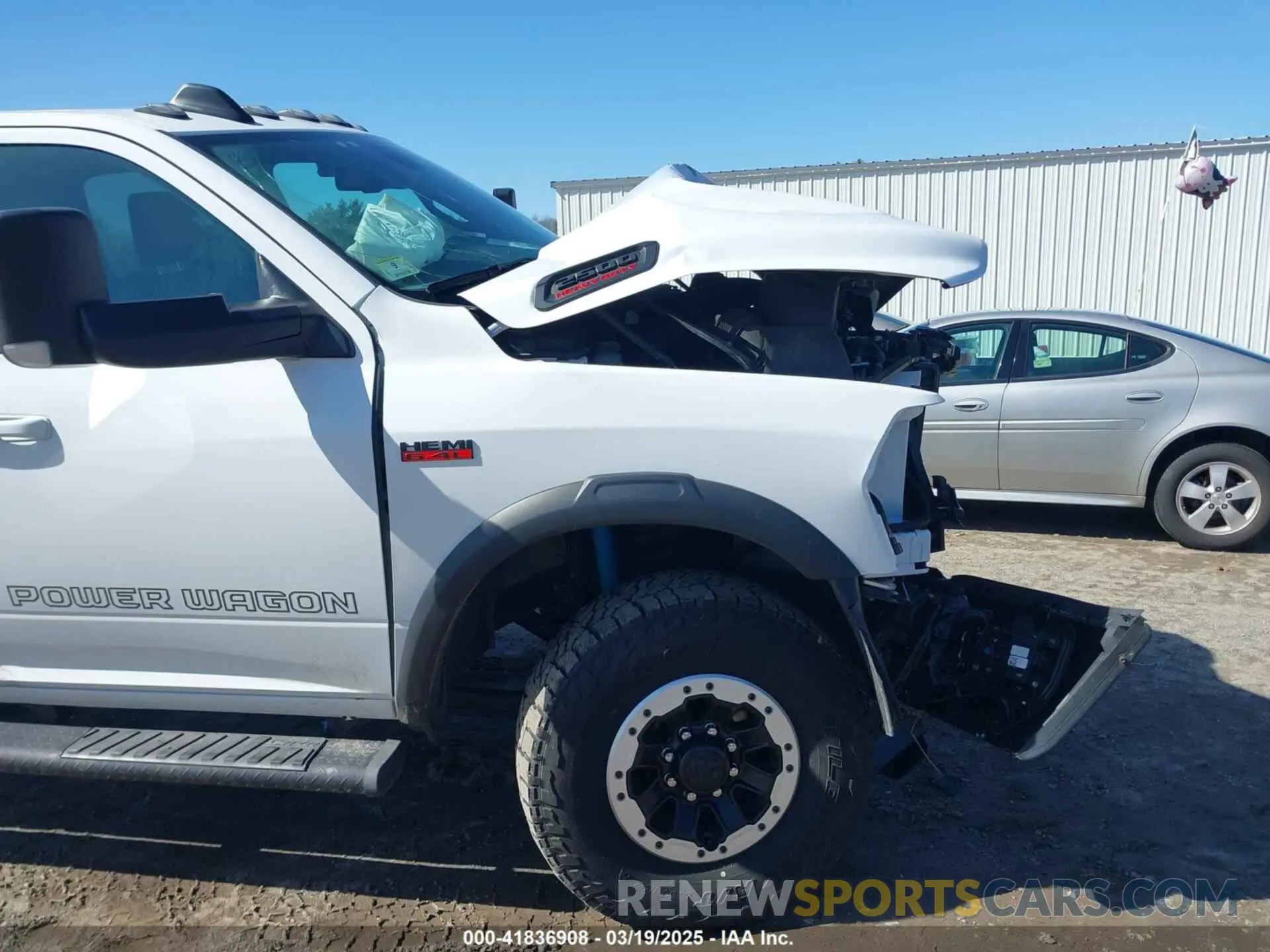 18 Photograph of a damaged car 3C6TR5EJ7MG658697 RAM 2500 2021