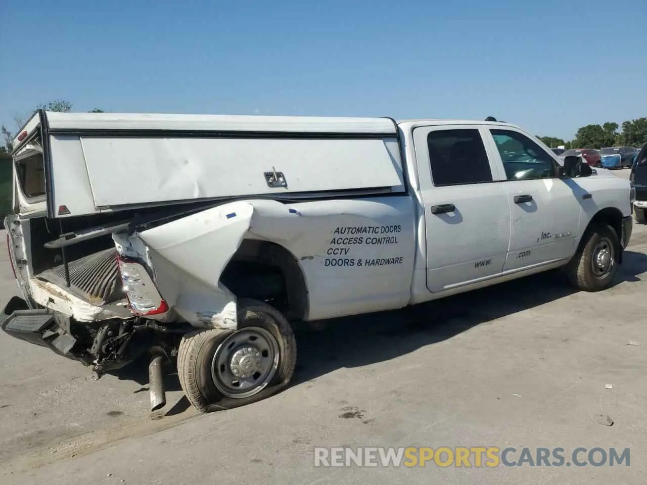 3 Photograph of a damaged car 3C6UR4HJ1MG648385 RAM 2500 2021