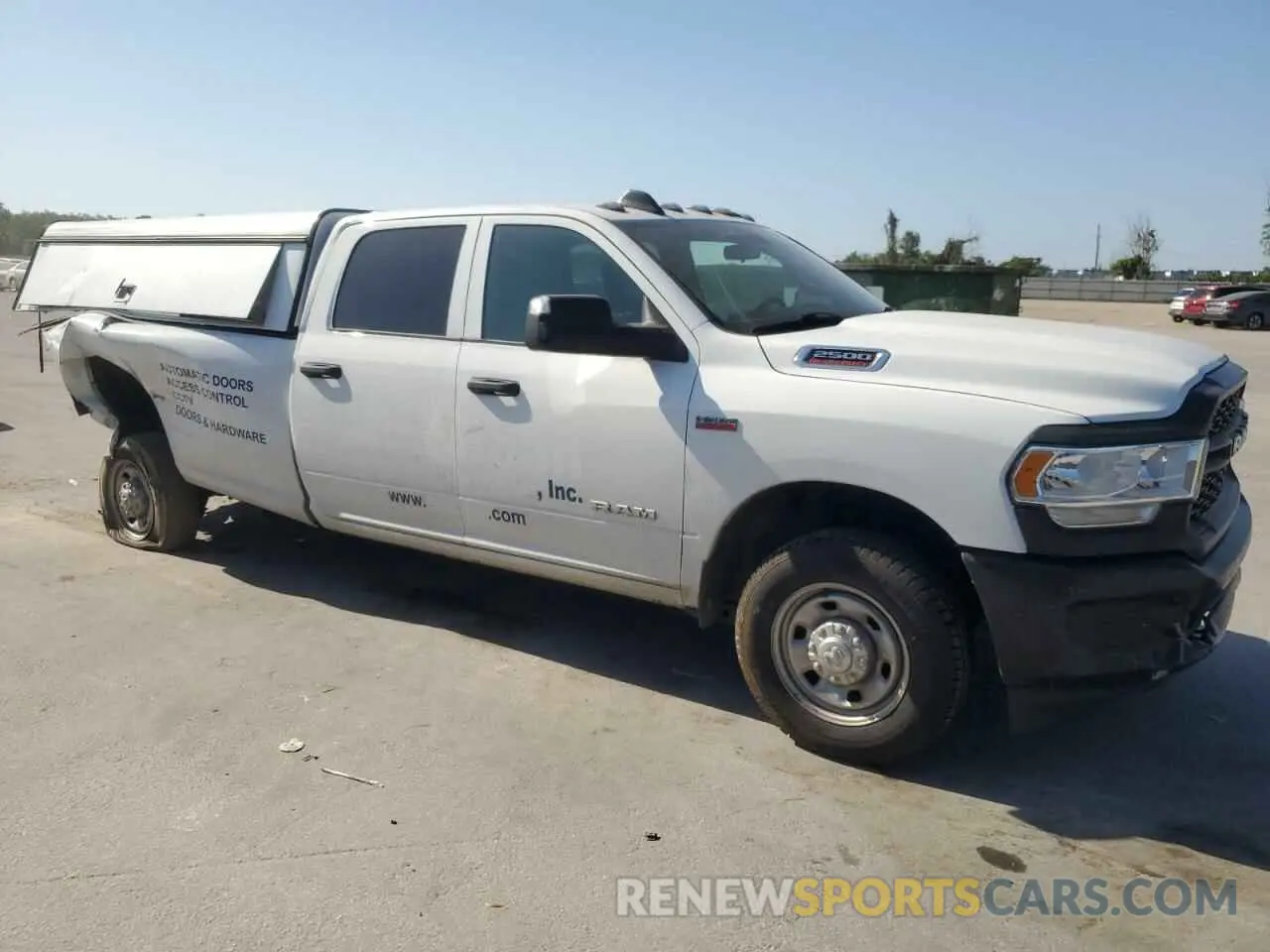 4 Photograph of a damaged car 3C6UR4HJ1MG648385 RAM 2500 2021
