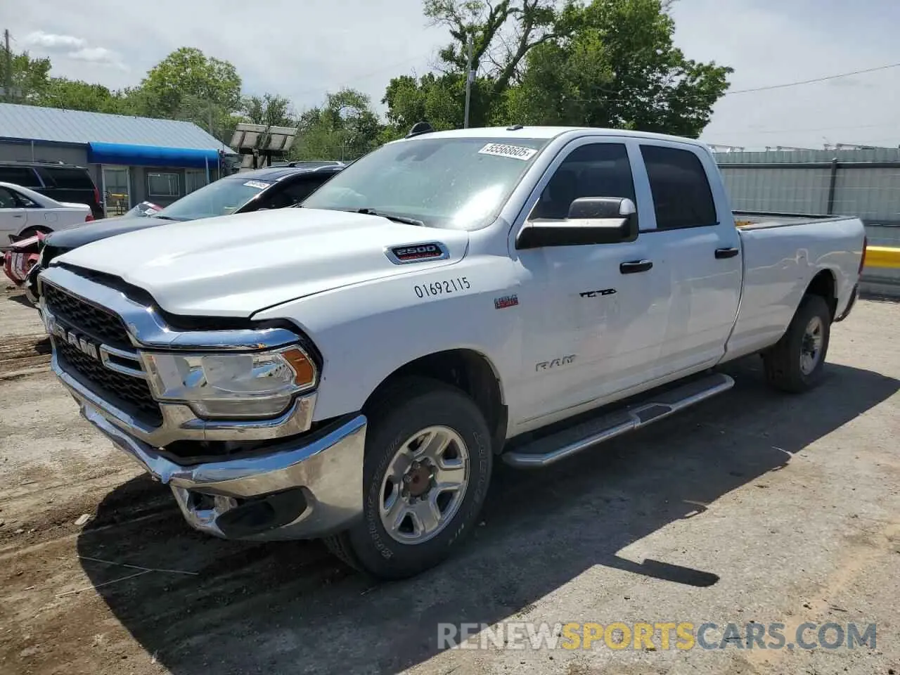 1 Photograph of a damaged car 3C6UR4HJ2MG604556 RAM 2500 2021