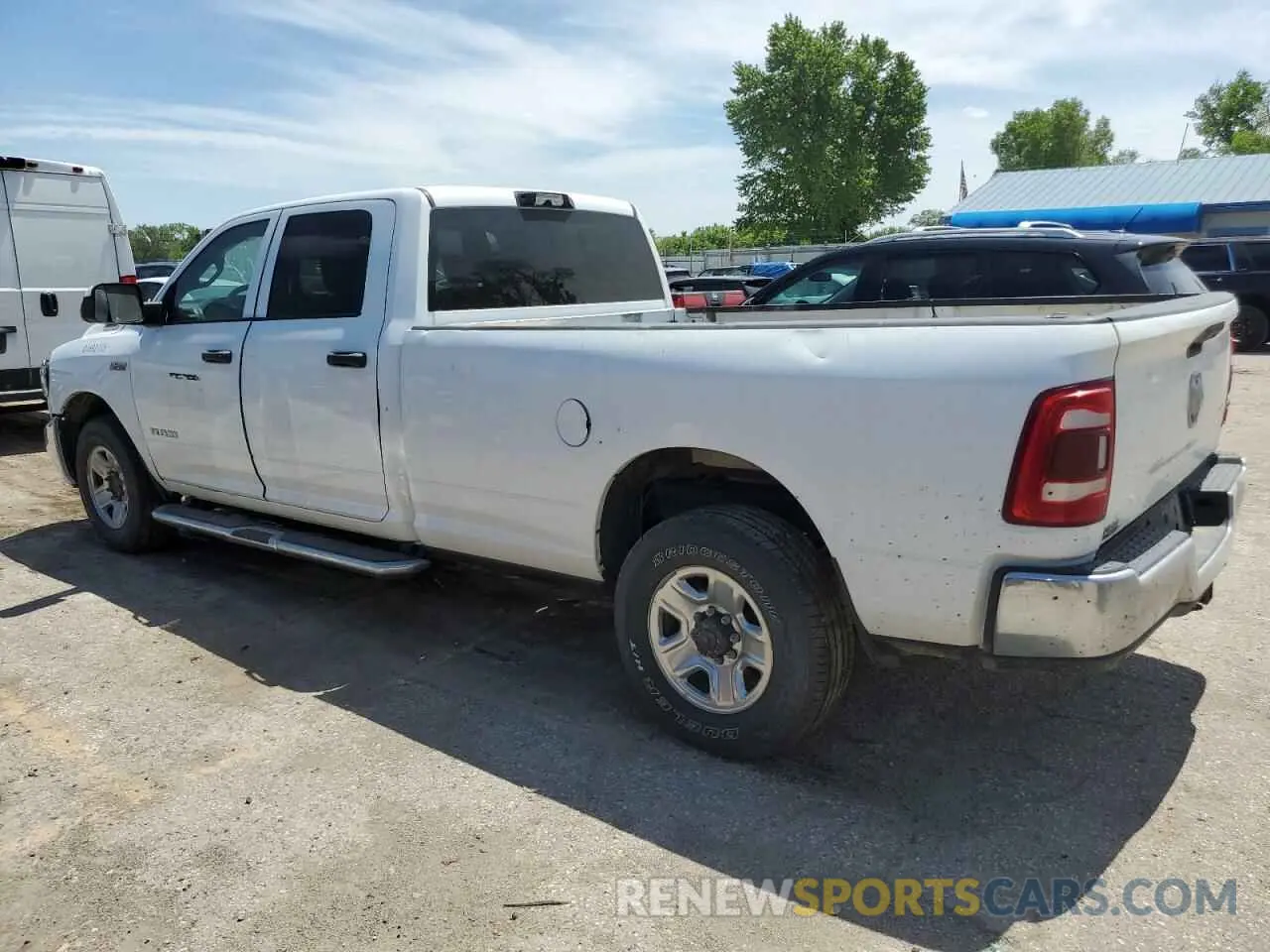 2 Photograph of a damaged car 3C6UR4HJ2MG604556 RAM 2500 2021