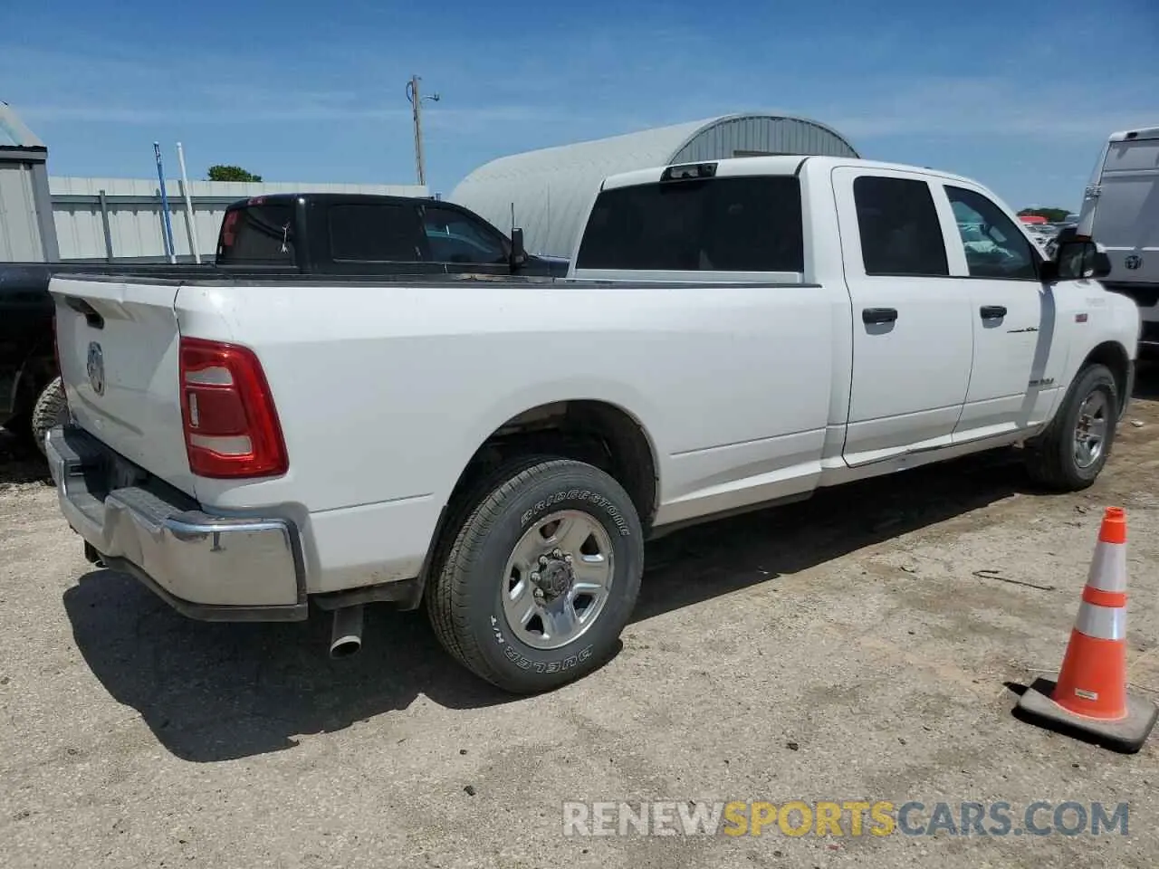 3 Photograph of a damaged car 3C6UR4HJ2MG604556 RAM 2500 2021
