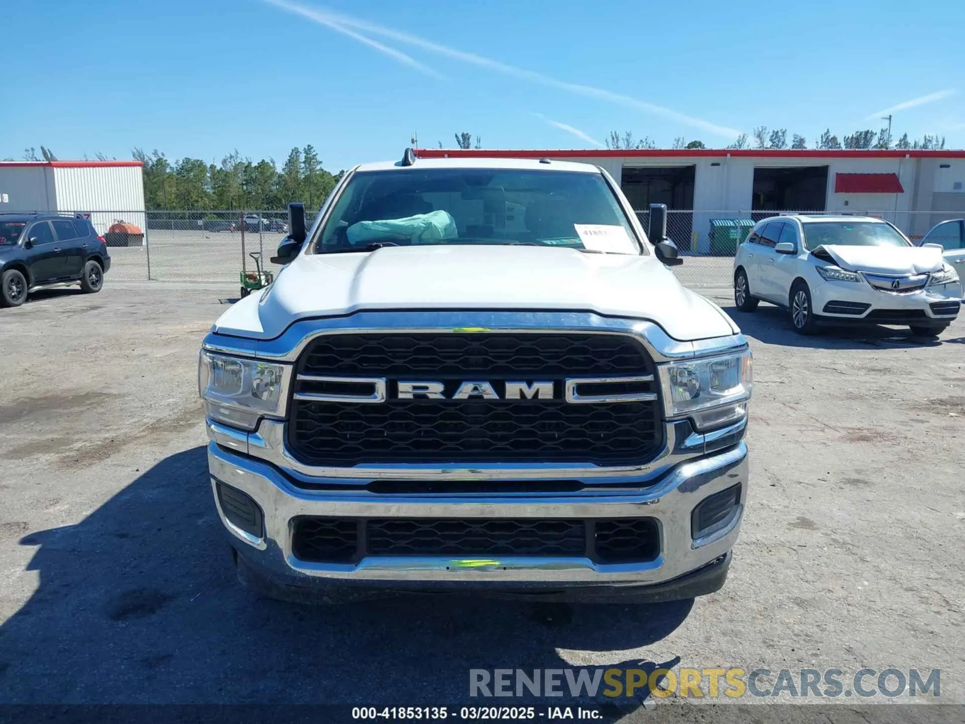 12 Photograph of a damaged car 3C6UR4HJ3MG501081 RAM 2500 2021