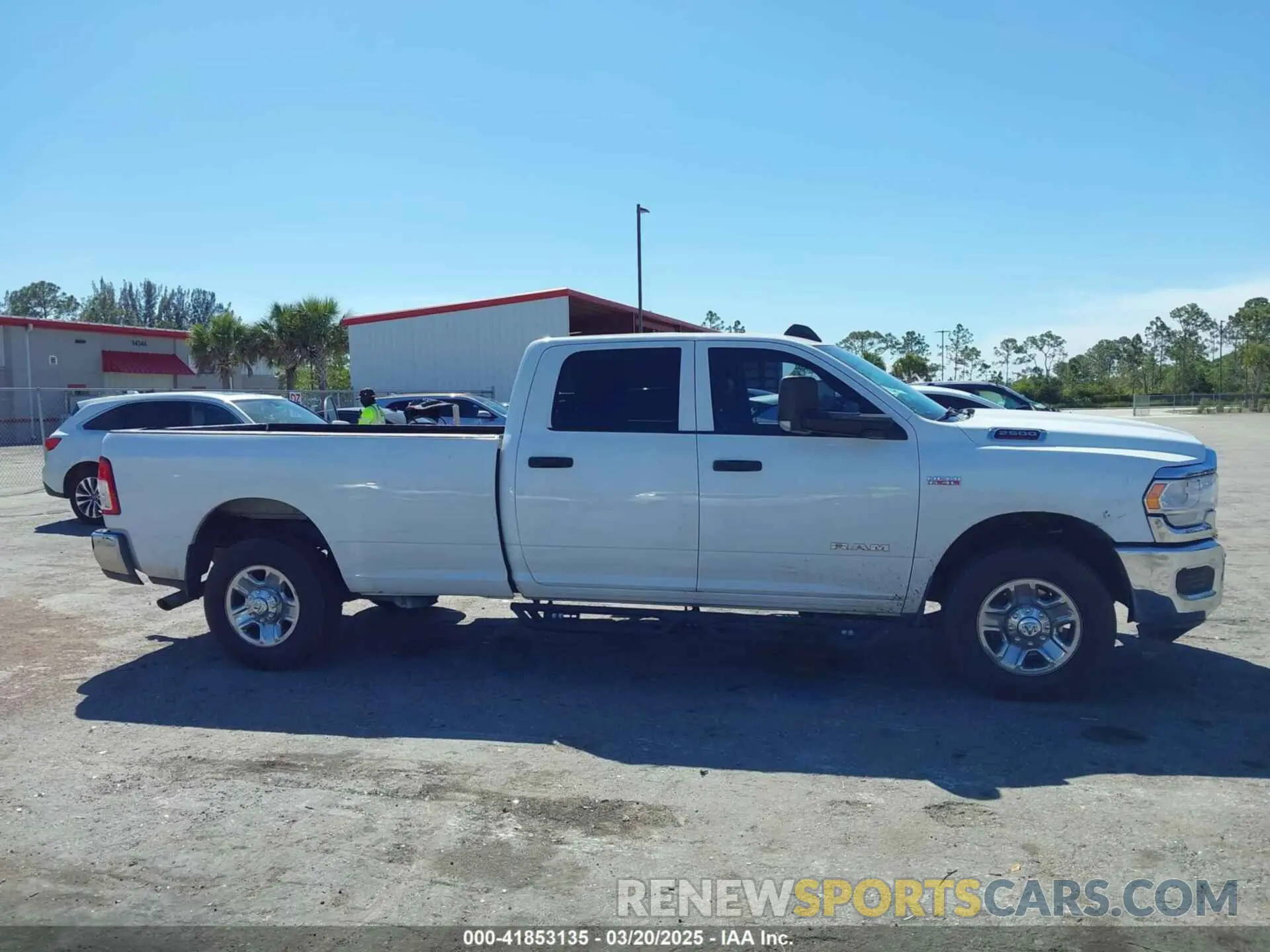 13 Photograph of a damaged car 3C6UR4HJ3MG501081 RAM 2500 2021