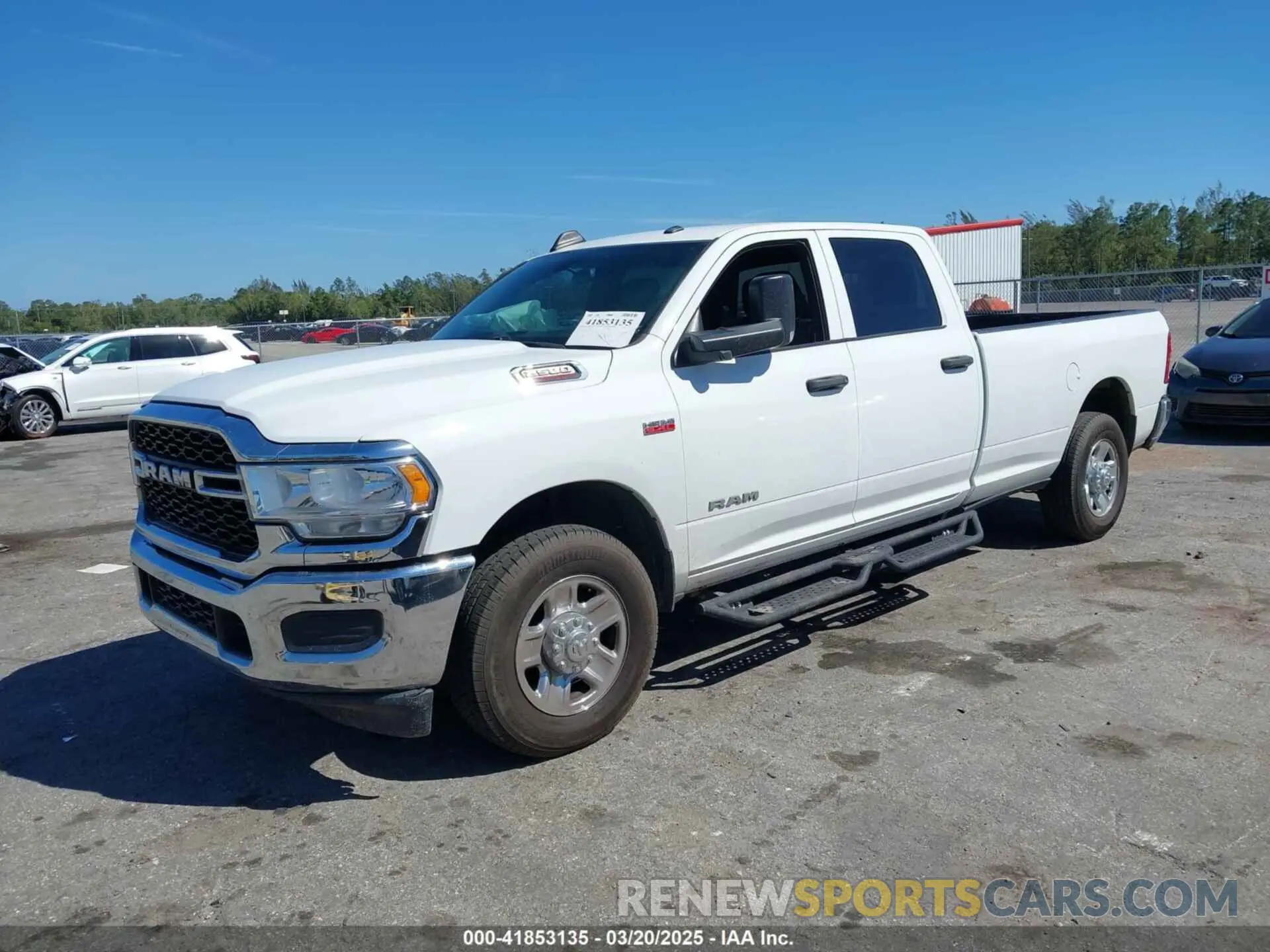 2 Photograph of a damaged car 3C6UR4HJ3MG501081 RAM 2500 2021