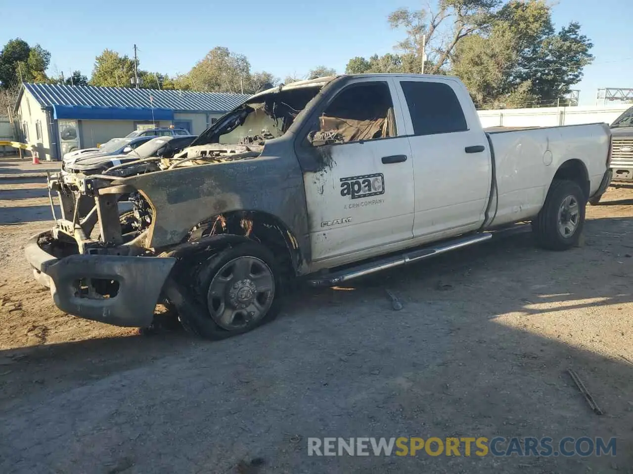 1 Photograph of a damaged car 3C6UR4HJ3MG600449 RAM 2500 2021
