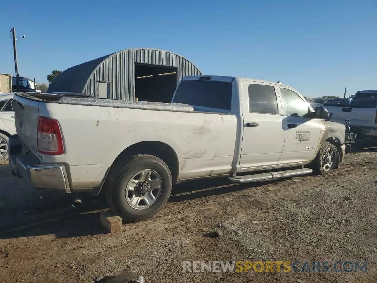 3 Photograph of a damaged car 3C6UR4HJ3MG600449 RAM 2500 2021