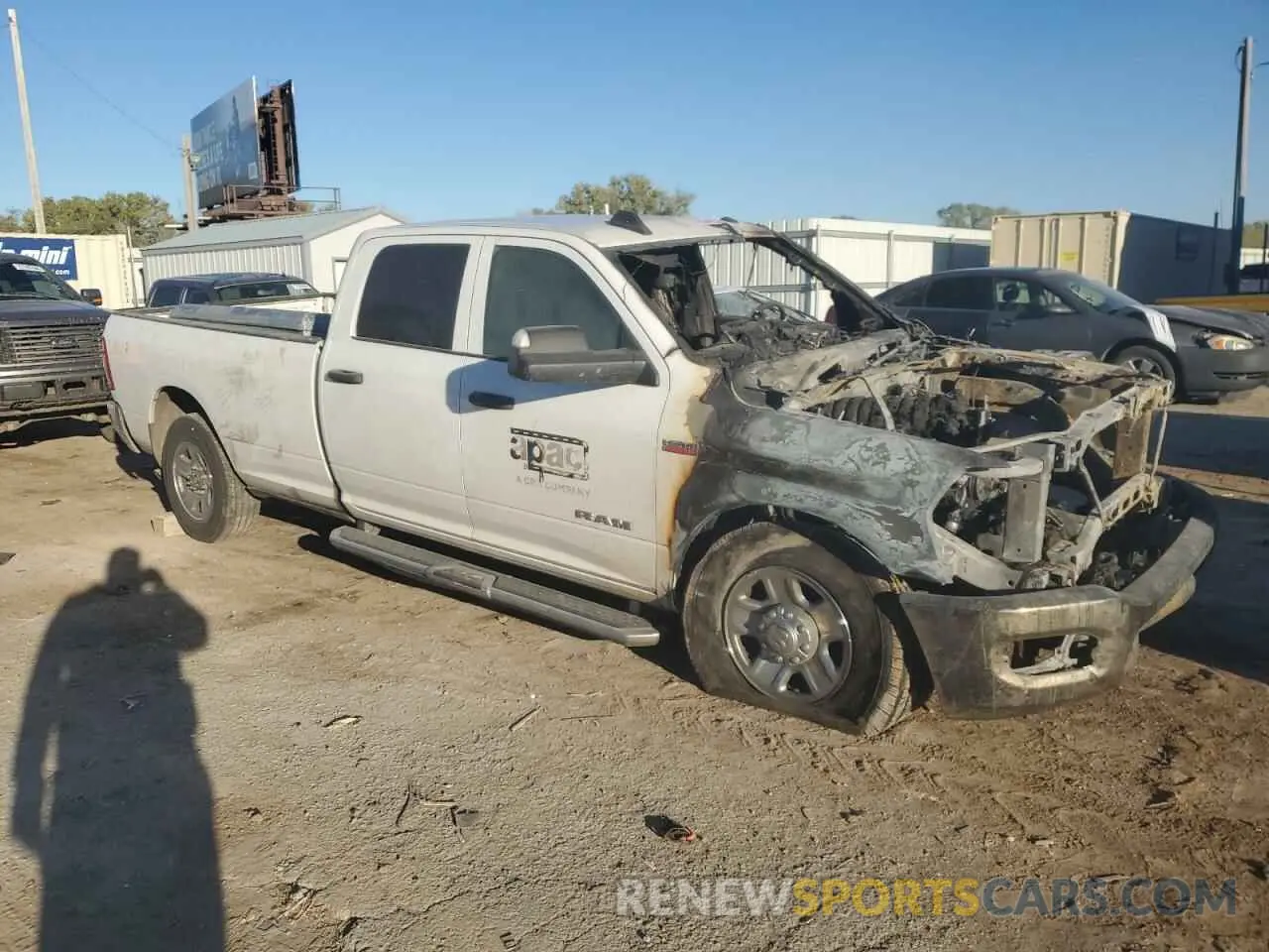 4 Photograph of a damaged car 3C6UR4HJ3MG600449 RAM 2500 2021