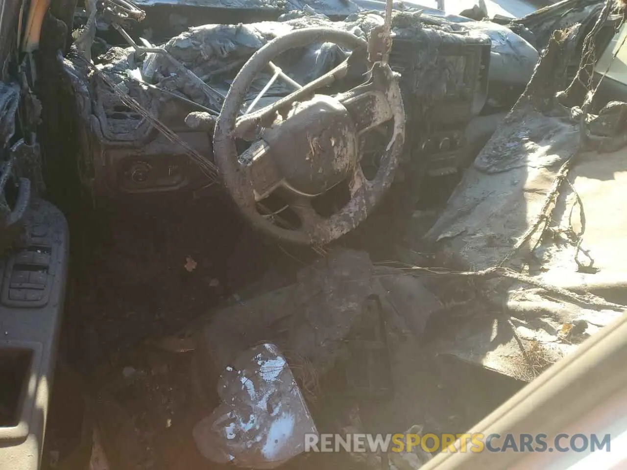 8 Photograph of a damaged car 3C6UR4HJ3MG600449 RAM 2500 2021