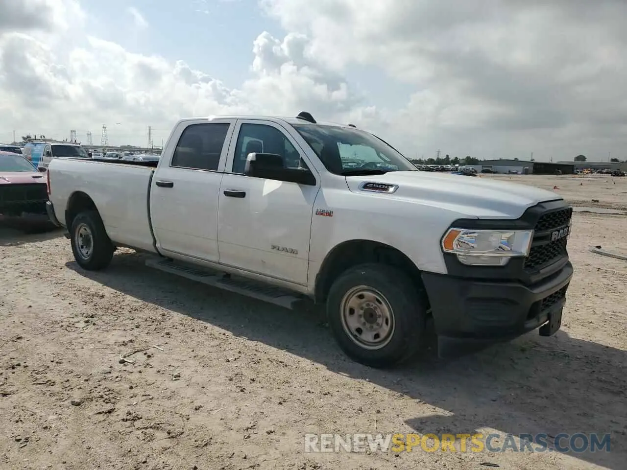 4 Photograph of a damaged car 3C6UR4HJ6MG501060 RAM 2500 2021