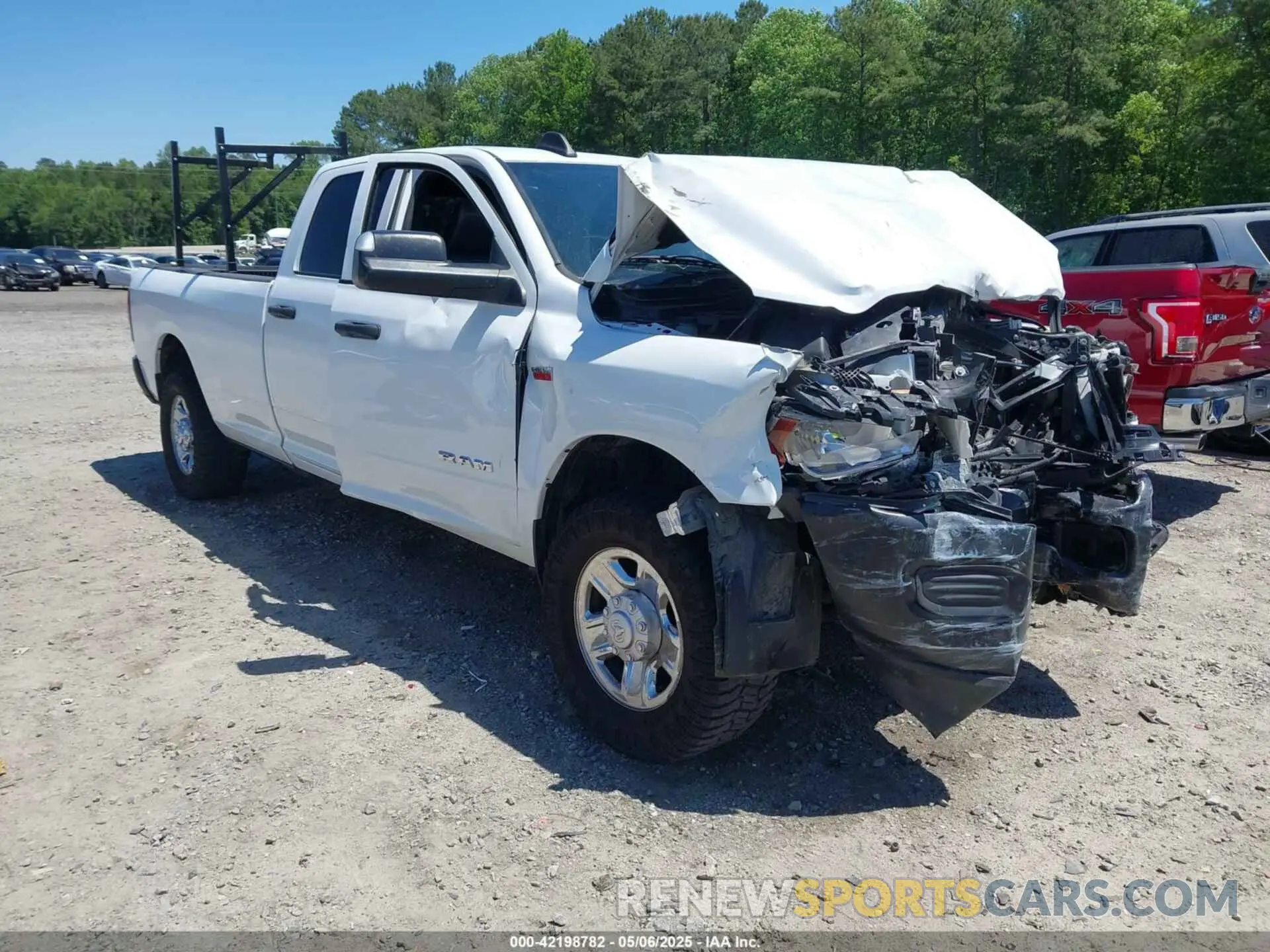 1 Photograph of a damaged car 3C6UR4HJXMG674094 RAM 2500 2021
