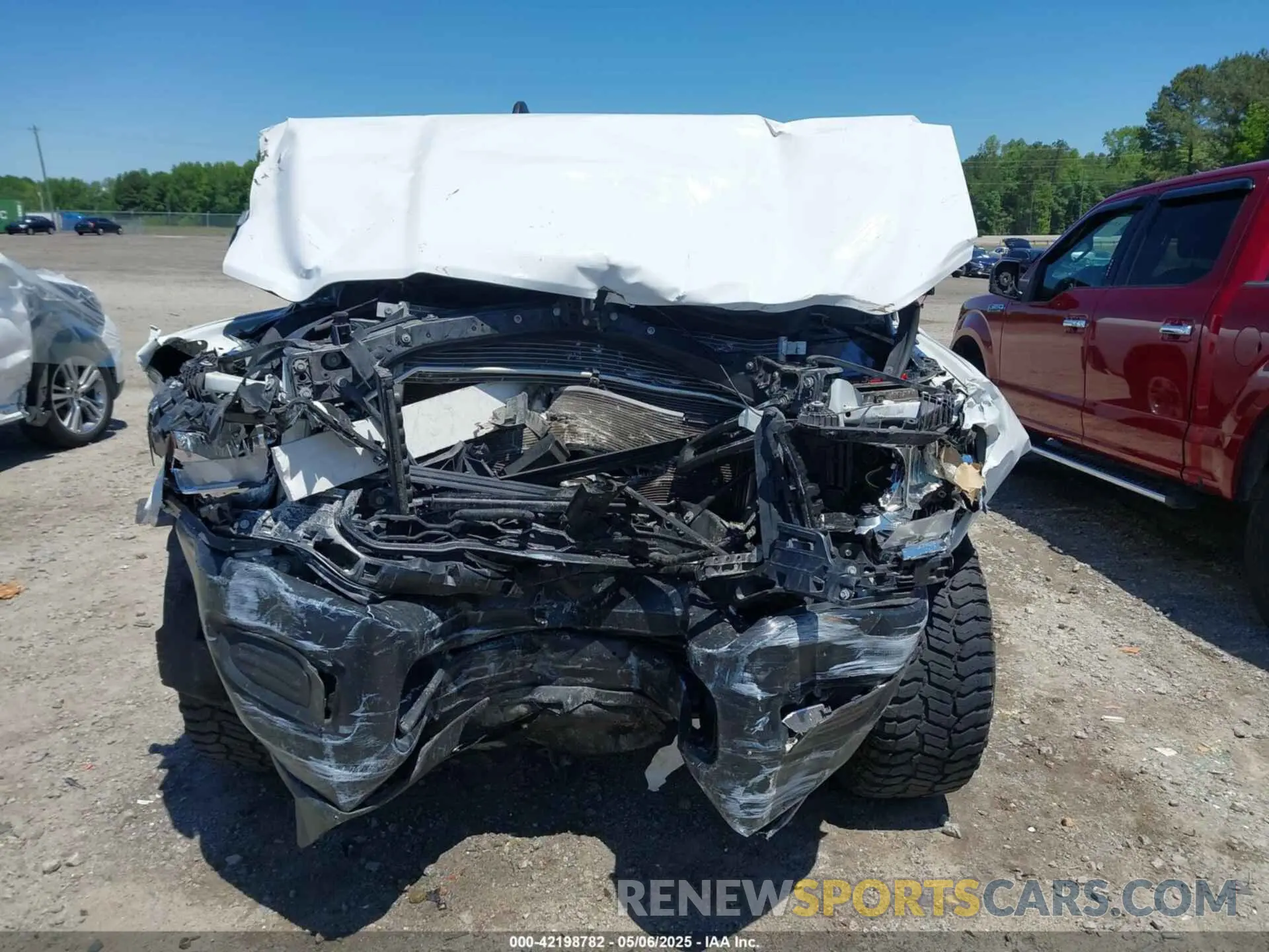 12 Photograph of a damaged car 3C6UR4HJXMG674094 RAM 2500 2021