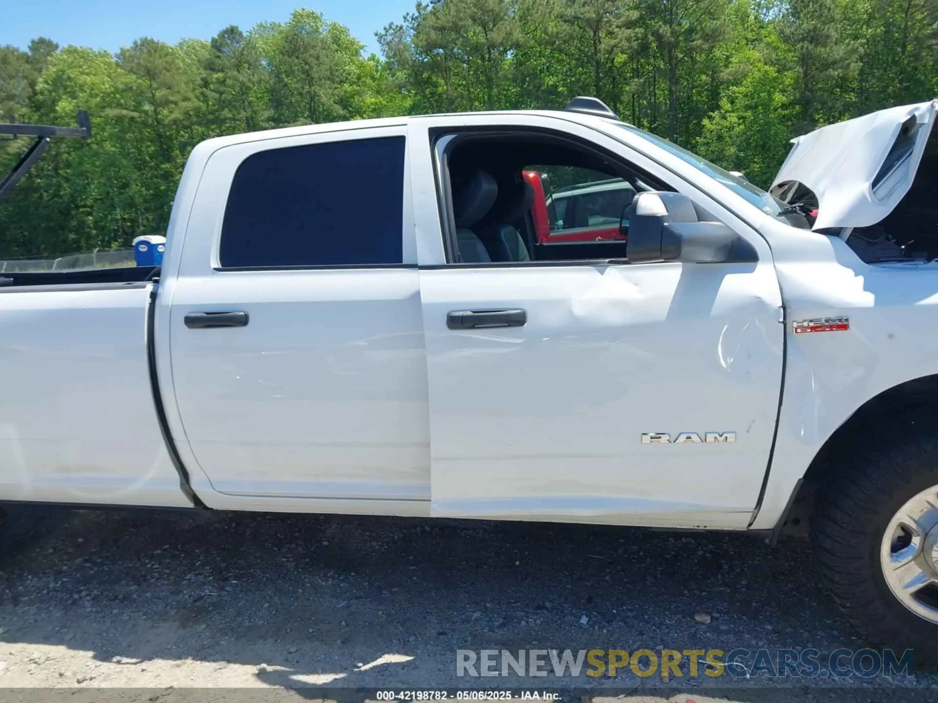13 Photograph of a damaged car 3C6UR4HJXMG674094 RAM 2500 2021