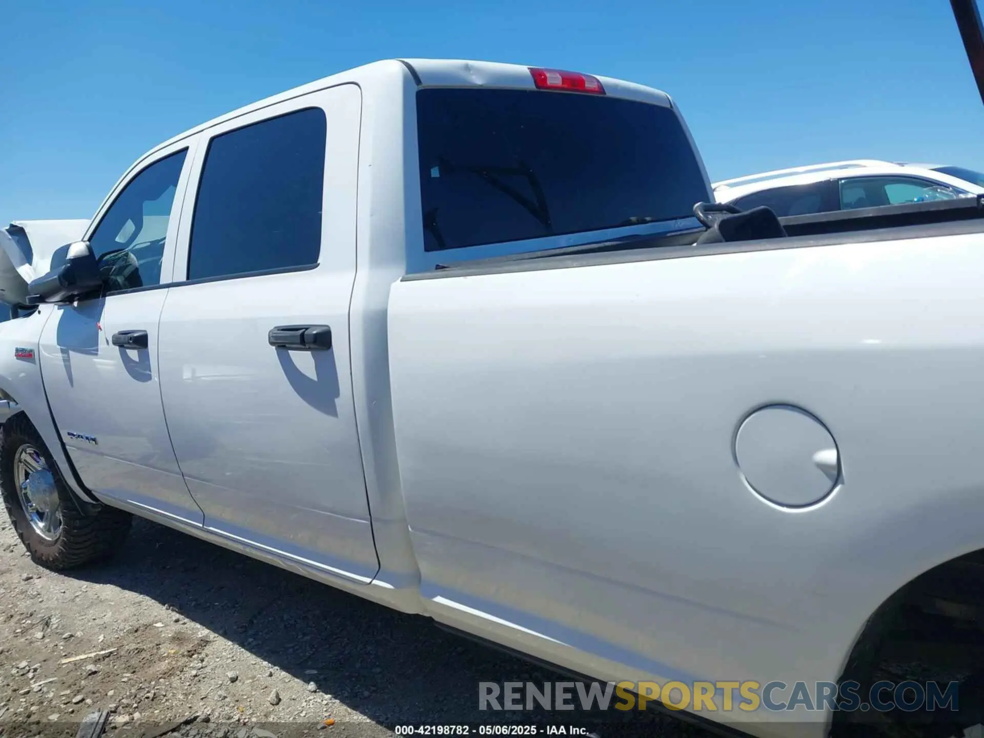 14 Photograph of a damaged car 3C6UR4HJXMG674094 RAM 2500 2021