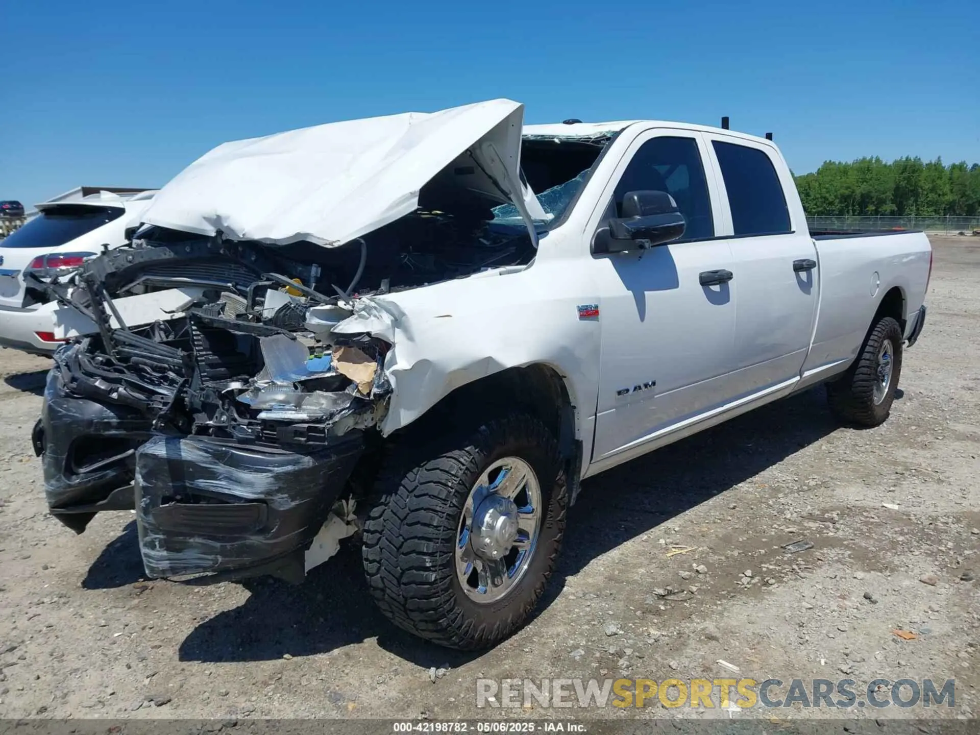 2 Photograph of a damaged car 3C6UR4HJXMG674094 RAM 2500 2021