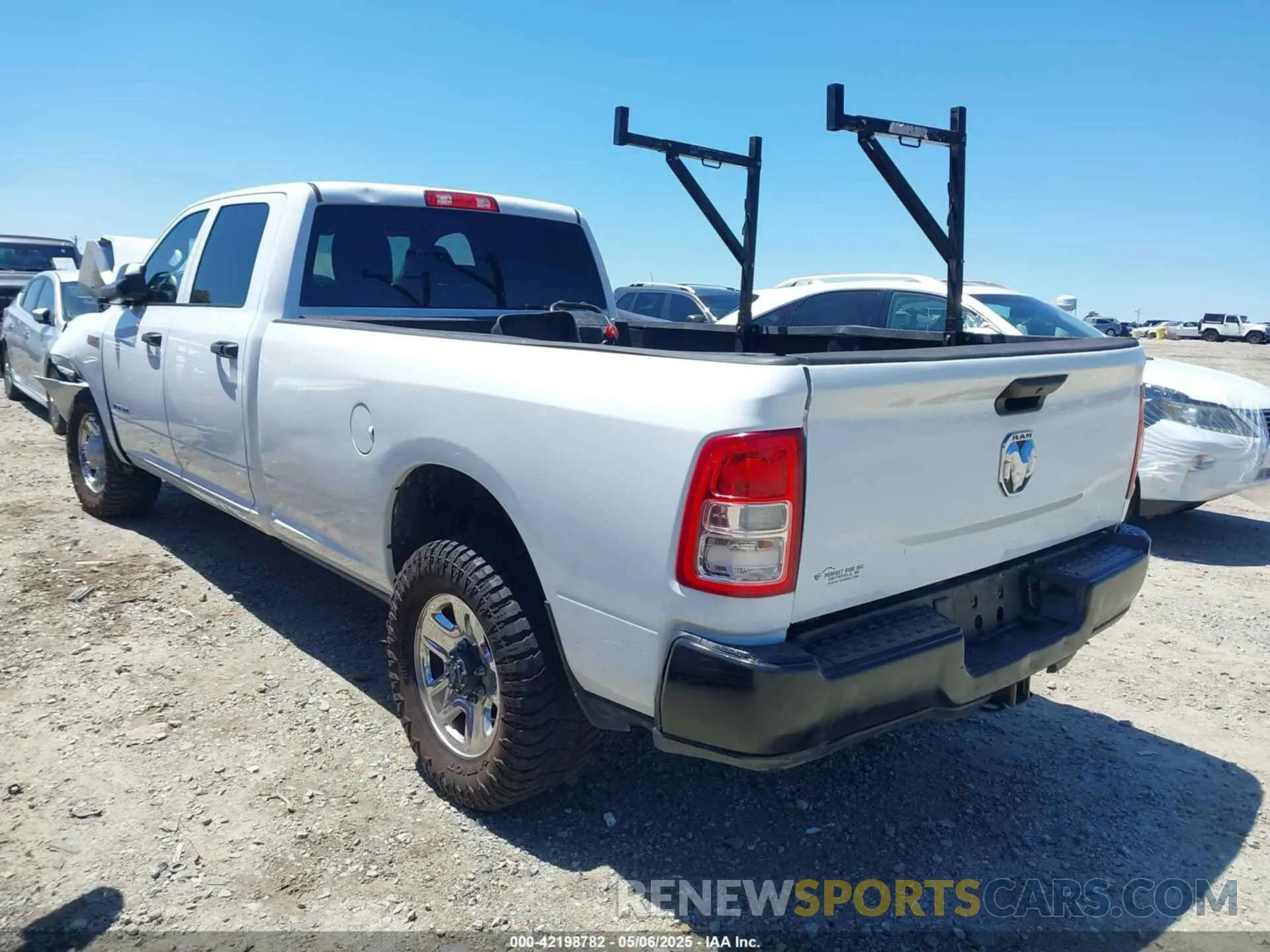 3 Photograph of a damaged car 3C6UR4HJXMG674094 RAM 2500 2021
