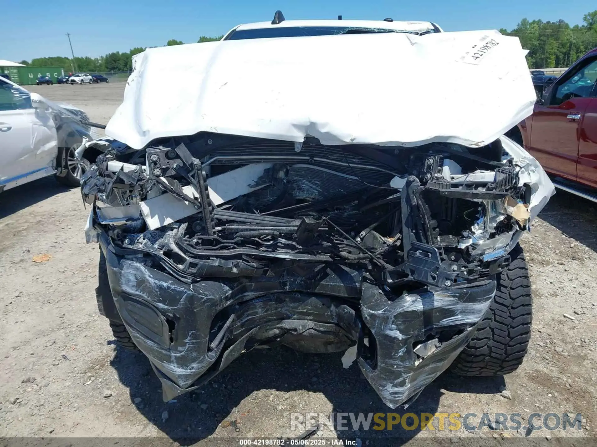 6 Photograph of a damaged car 3C6UR4HJXMG674094 RAM 2500 2021