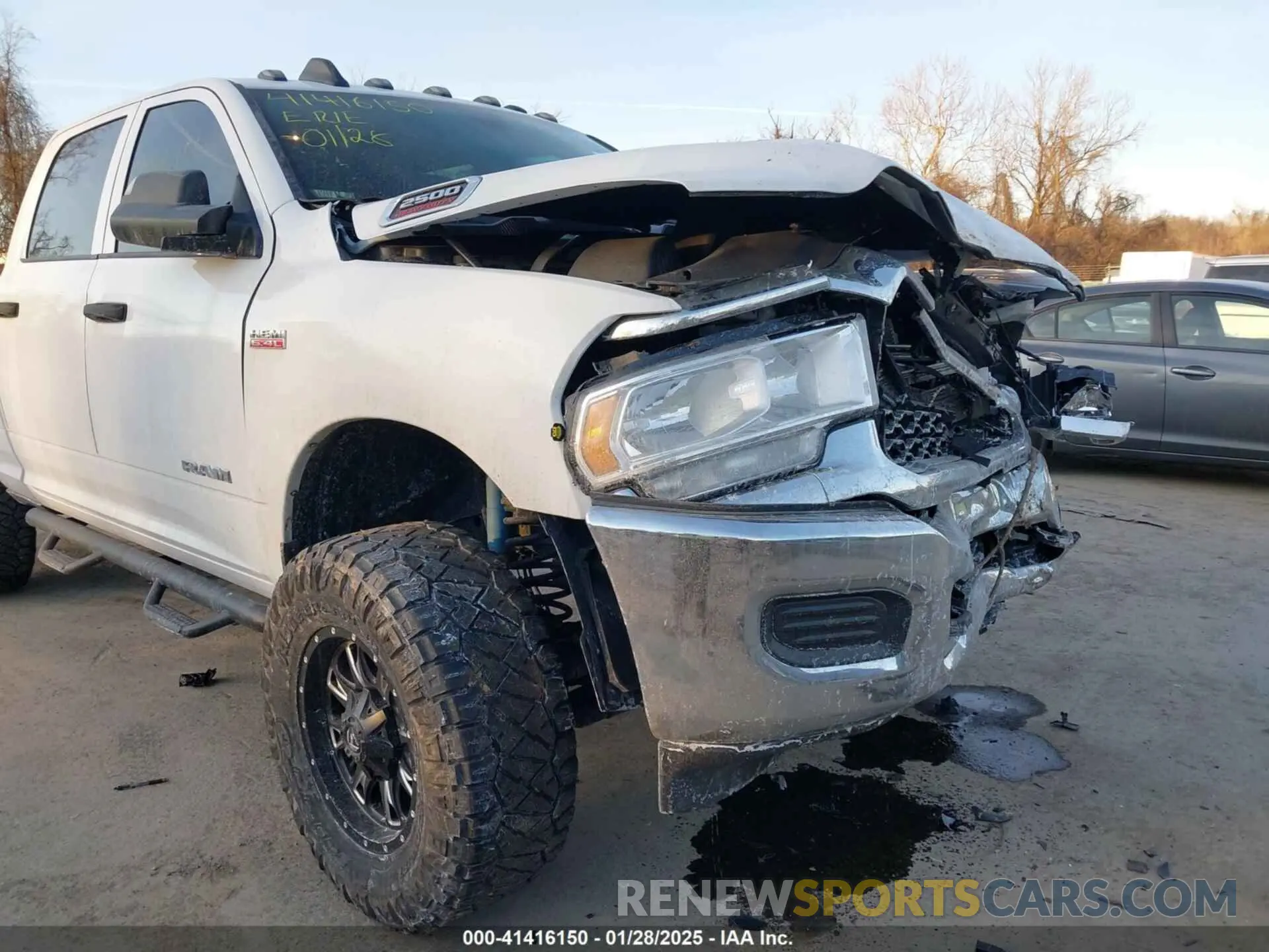 19 Photograph of a damaged car 3C6UR5CJ1MG679326 RAM 2500 2021