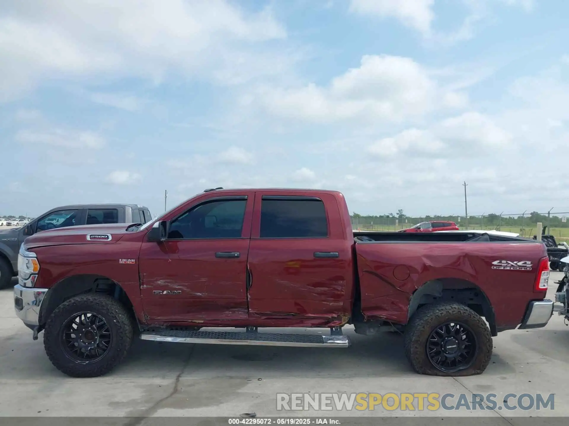14 Photograph of a damaged car 3C6UR5CJ2MG502977 RAM 2500 2021