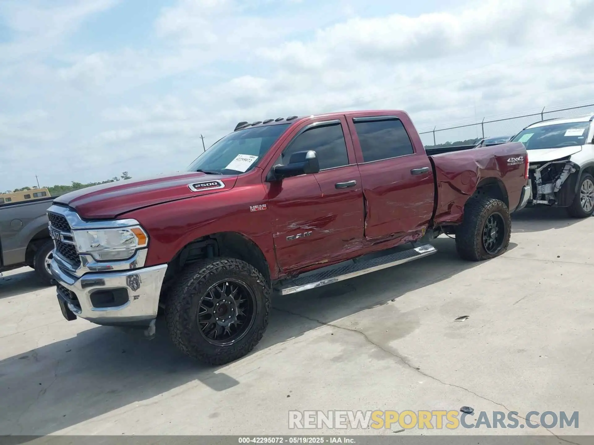 2 Photograph of a damaged car 3C6UR5CJ2MG502977 RAM 2500 2021