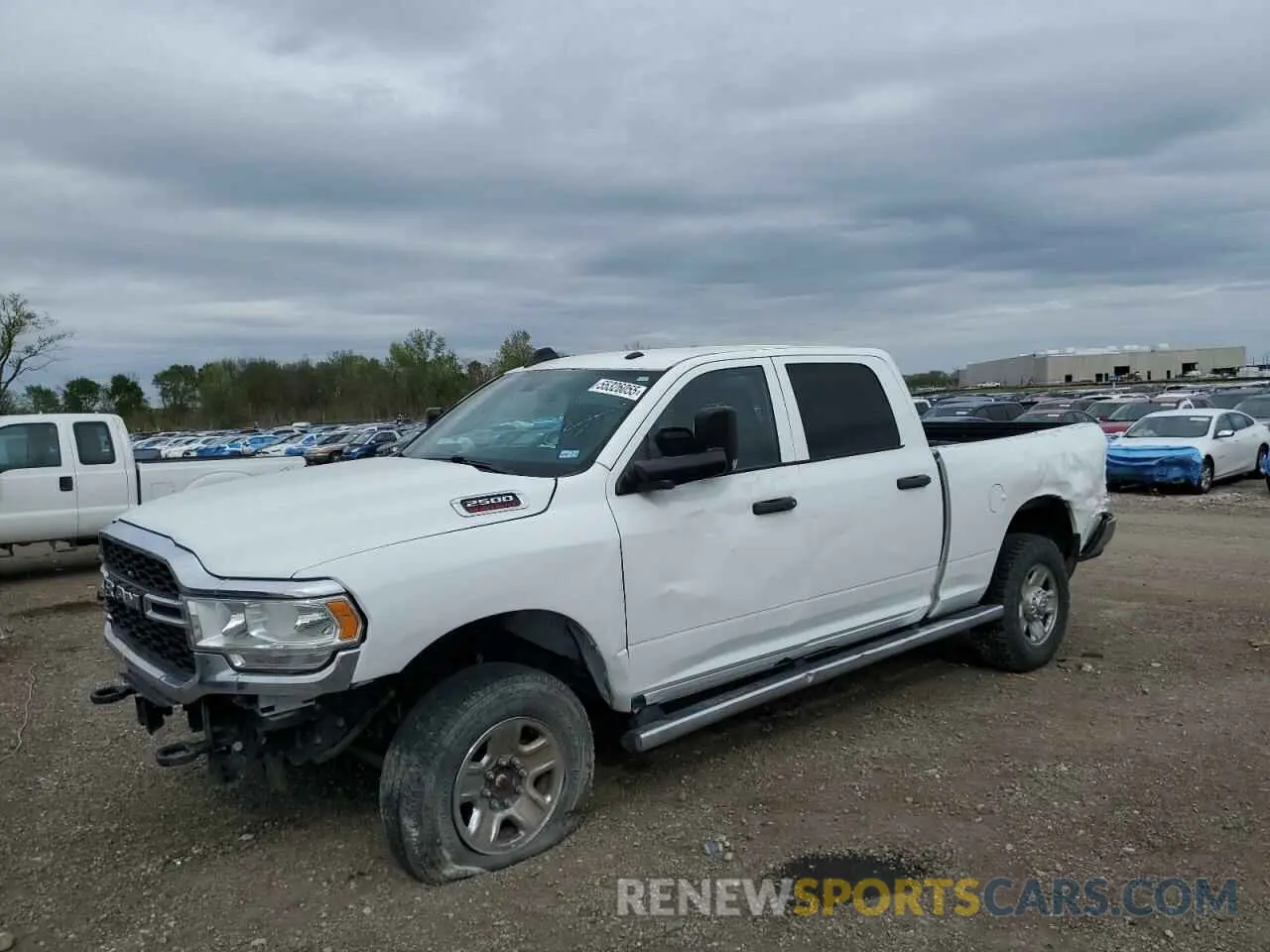 1 Photograph of a damaged car 3C6UR5CJ2MG558658 RAM 2500 2021